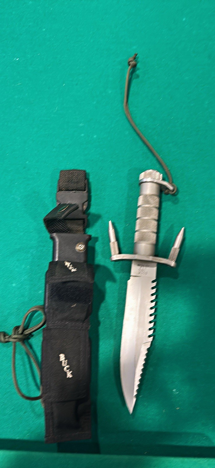 1986 Buck 184 Buckmaster Patent Pending survival knife sheath anchor spikes USA 1986 Buck 184 Buckmaster Patent Pending survival knife sheath anchor spikes USA