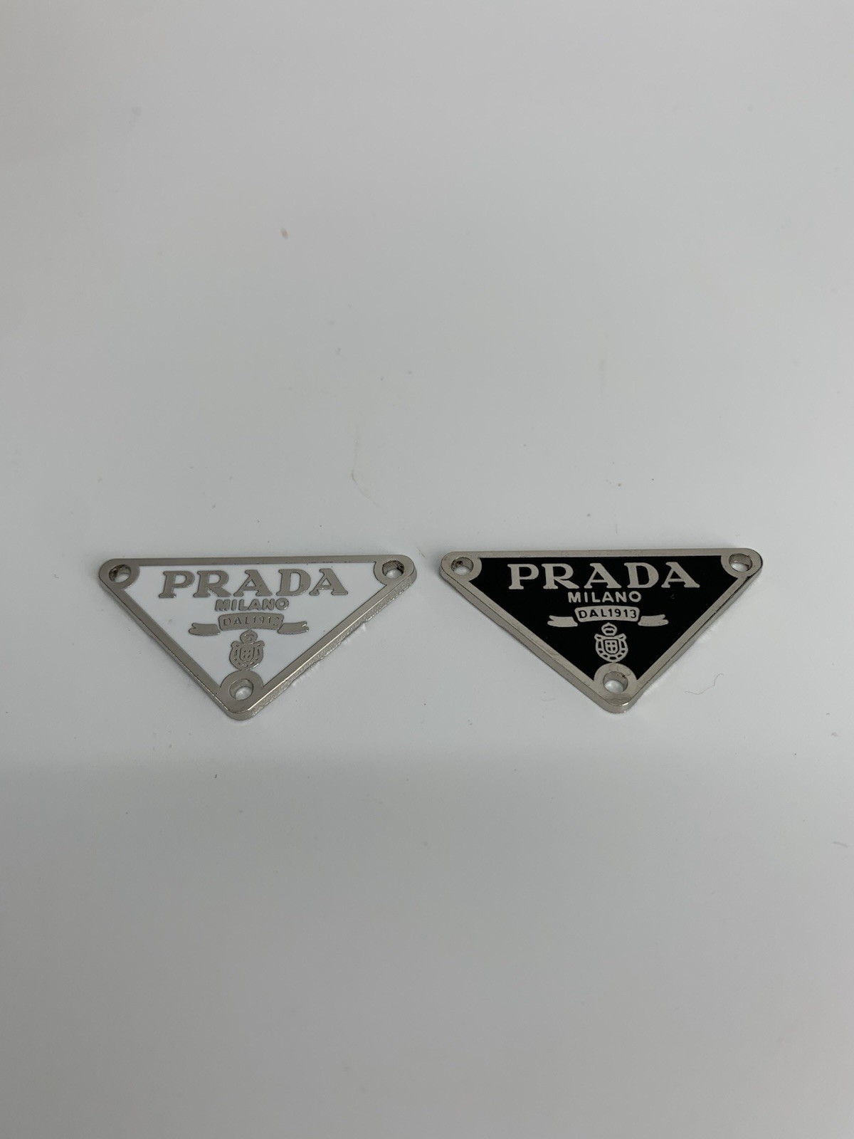 Prada Lot of 2 Replacement Triangle Black White Metal Logo Plates Prada Lot of 2 Replacement Triangle Black White Metal Logo Plates