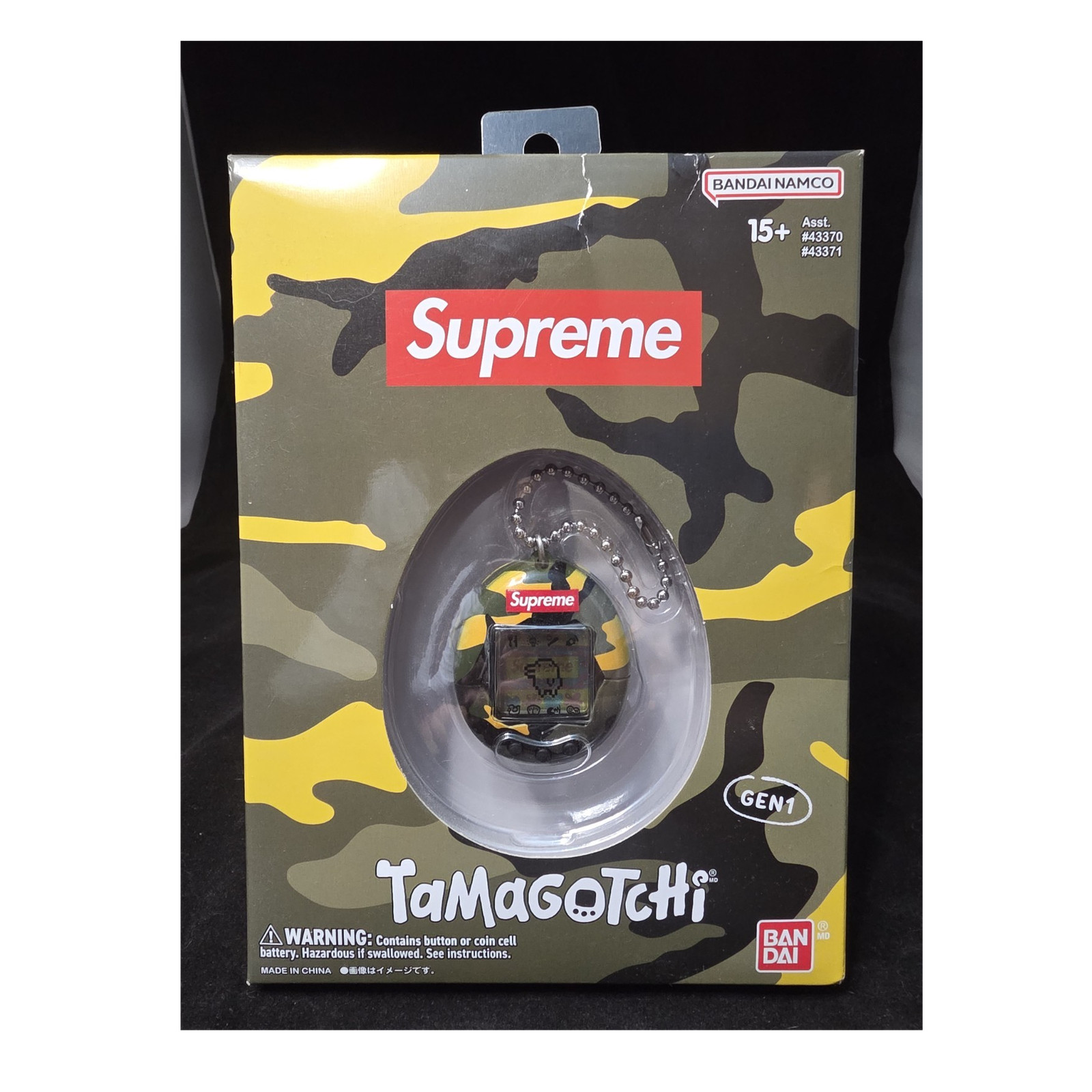 Supreme Tamagotchi Yellow Camo Bandai Namco Factory Sealed - Light Damage Supreme Tamagotchi Yellow Camo Bandai Namco Factory Sealed - Light Damage
