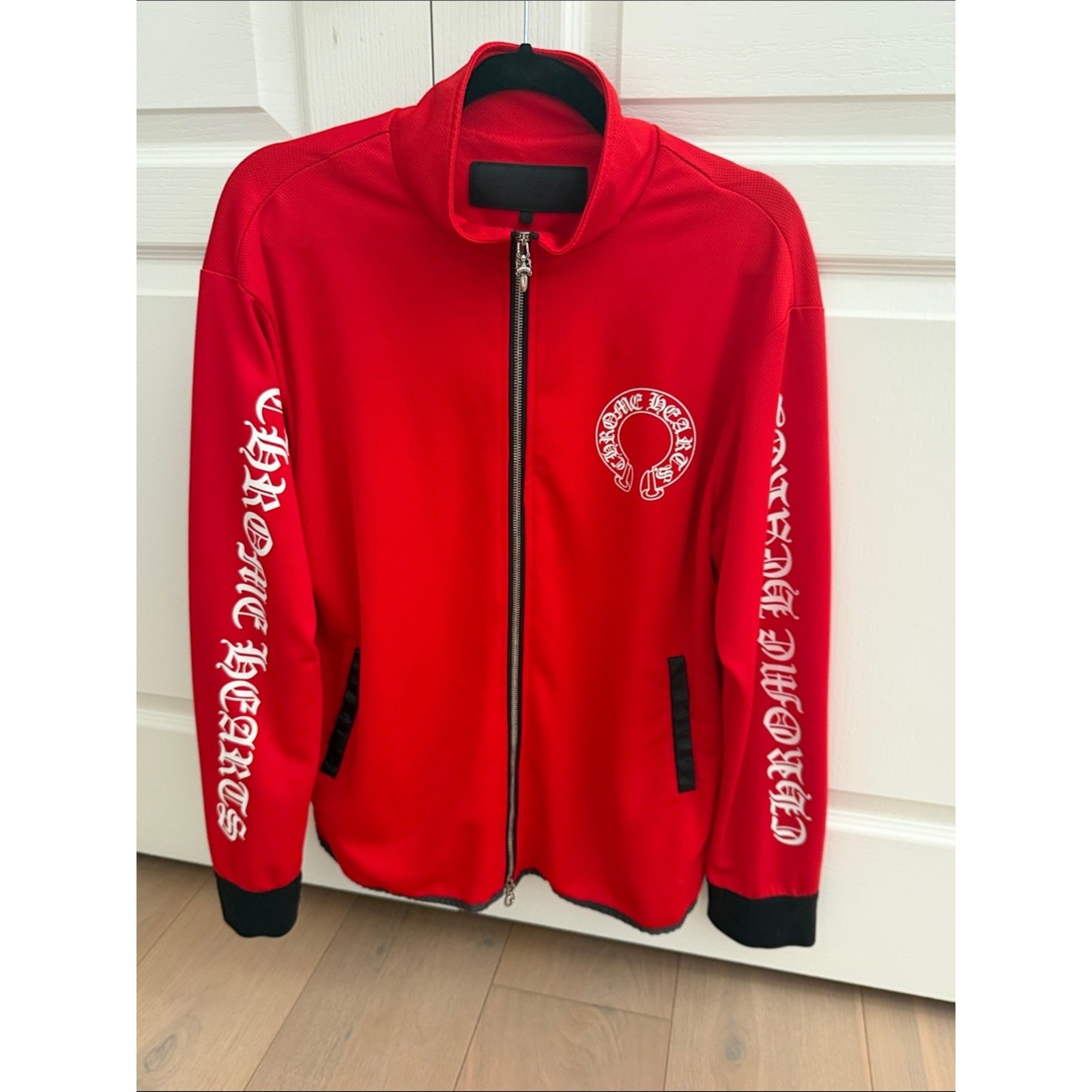 Chrome Hearts XL Horseshoe Logo Zip Up Track Jacket in red W/black. Logo pulls Chrome Hearts XL Horseshoe Logo Zip Up Track Jacket in red W/black. Logo pulls