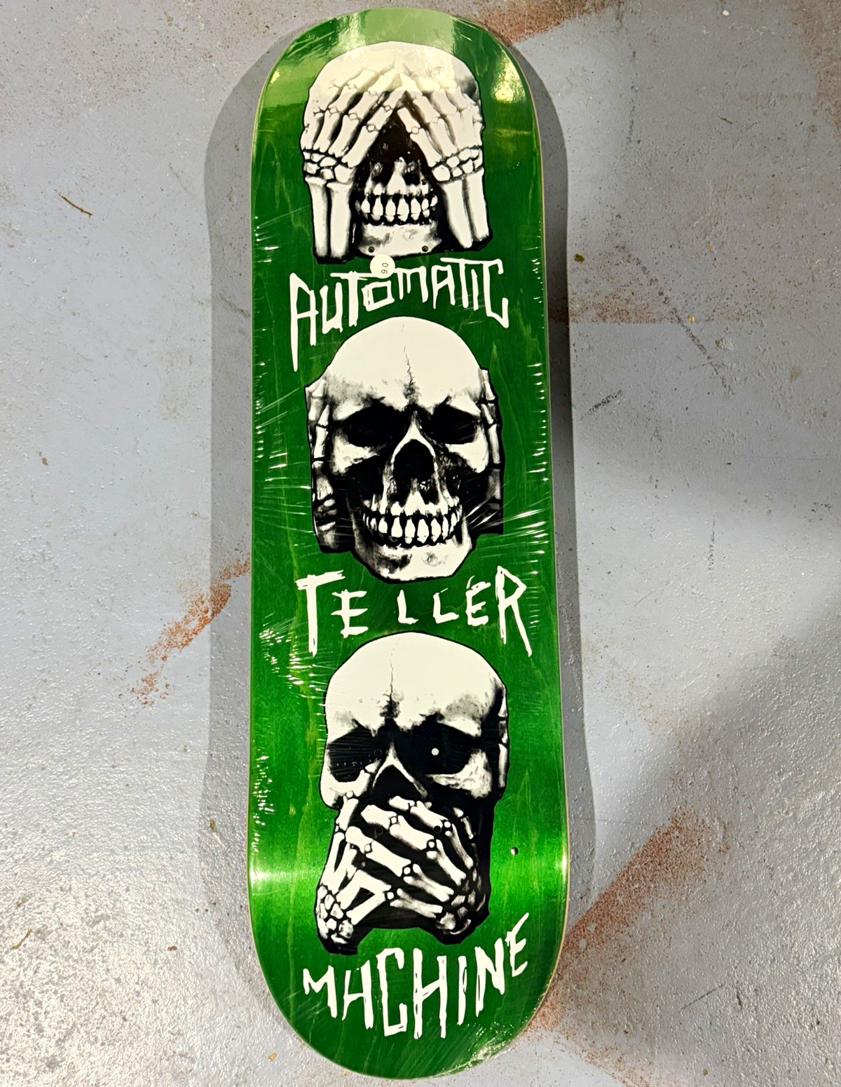 ATM Click Teller Machine Skateboard Deck Green Skull Graphic ATM Click Teller Machine Skateboard Deck Green Skull Graphic