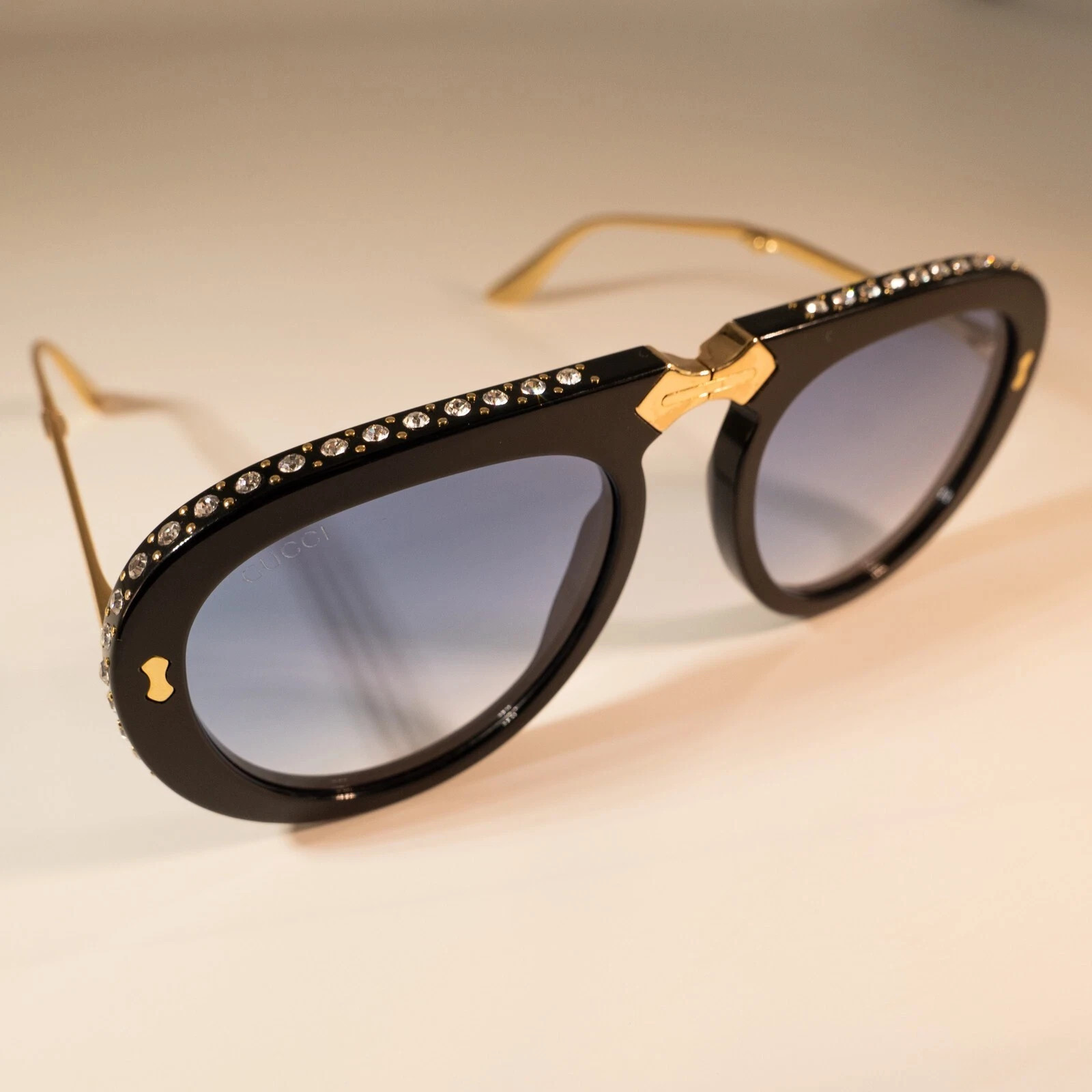 Gucci GG0307S 56mm Foldable Aviator Sunglasses in Black w.Crystals and Blue Lens