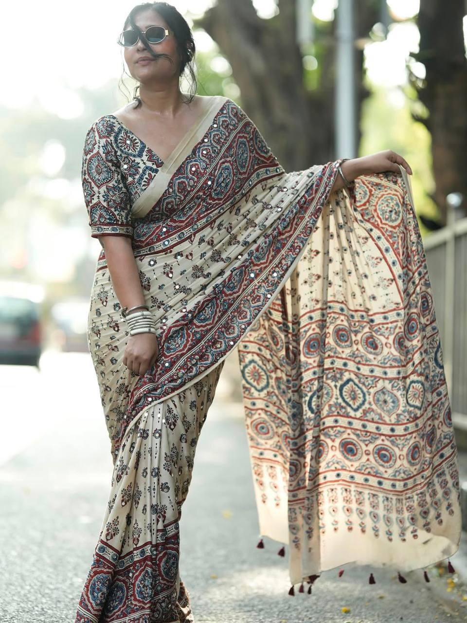 Semi Model Silk Ajrakh Print Saree Real Mirror Work Pallu Tassel Pompom Blouse