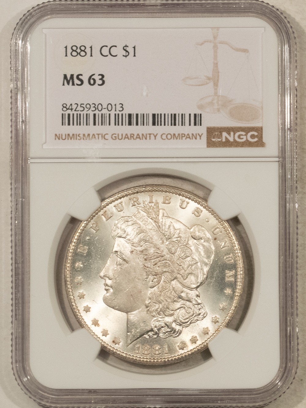 1881-CC $1 MORGAN DOLLAR - NGC MS-63, BLAST WHITE CARSON CITY 1881-CC $1 MORGAN DOLLAR - NGC MS-63, BLAST WHITE CARSON CITY