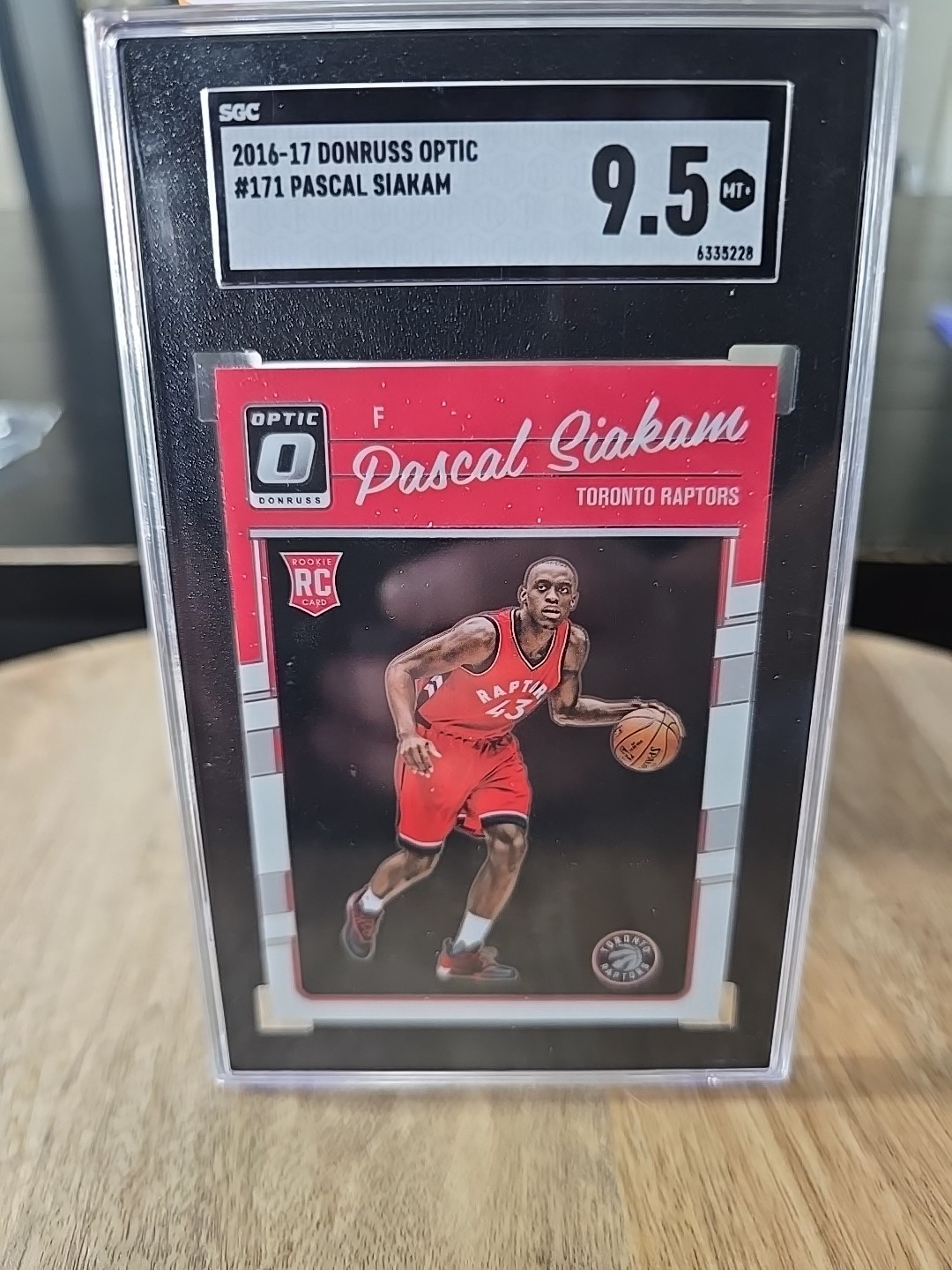 2016-17 Panini Donruss Optic Pascal Siakam #171 SGC 9.5 Mint+. 2016-17 Panini Donruss Optic Pascal Siakam #171 SGC 9.5 Mint+.