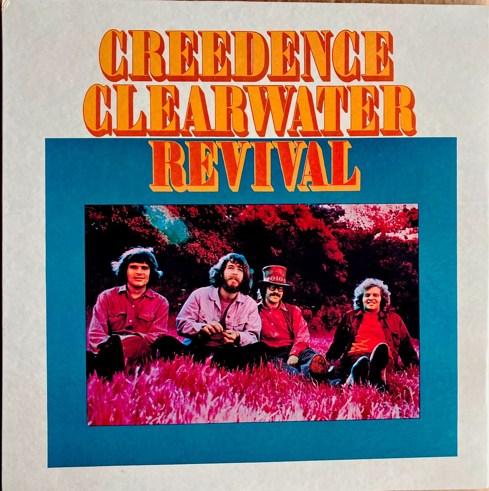 Original Hardcover 1969 Creedence Clearwater Revival Tour Book (New Old Stock)