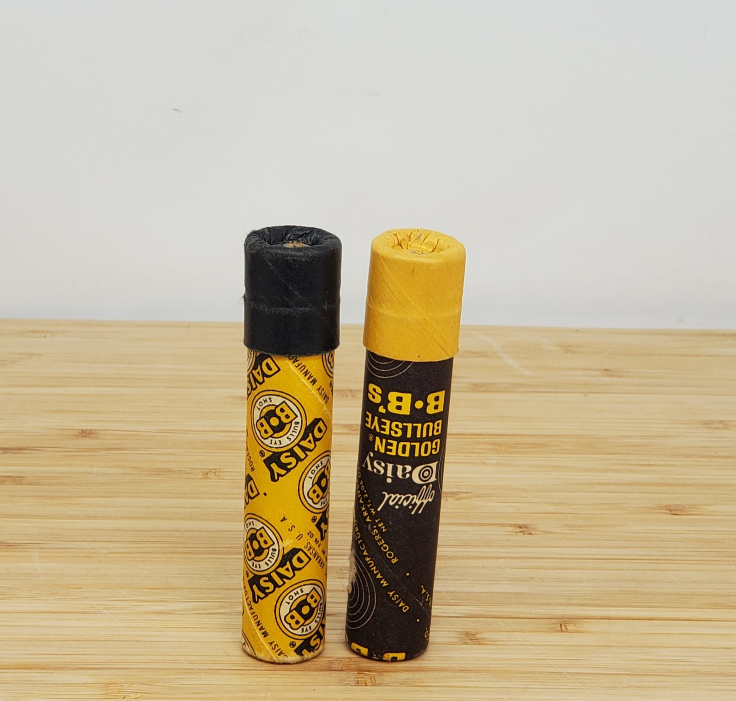 2 Vtg Daisy Golden Bullseye BB 2.06oz Paper Tubes Yellow & Black Cap Rogers AR