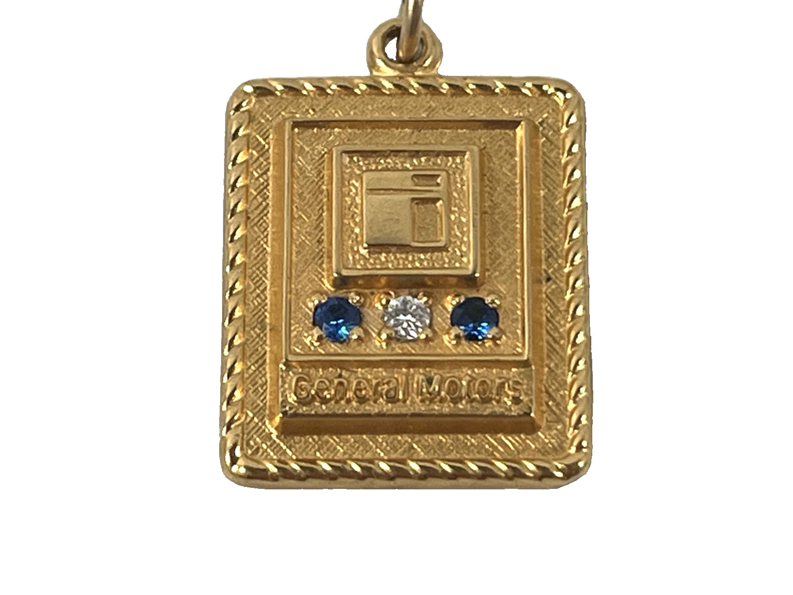 1/10 10K GOLD FILLED SAPPHIRES GENERAL MOTORS CHARM PENDANT 1/10 10K GOLD FILLED SAPPHIRES GENERAL MOTORS CHARM PENDANT