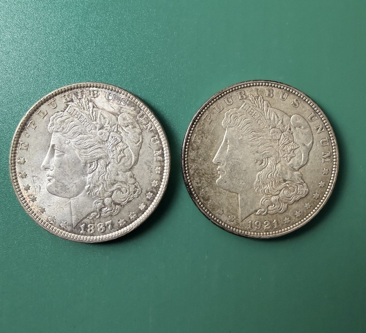 Vintage Pair of 1887 1921 Morgan US Silver One Dollar Coin x2 Circulated Coins Vintage Pair of 1887 1921 Morgan US Silver One Dollar Coin x2 Circulated Coins