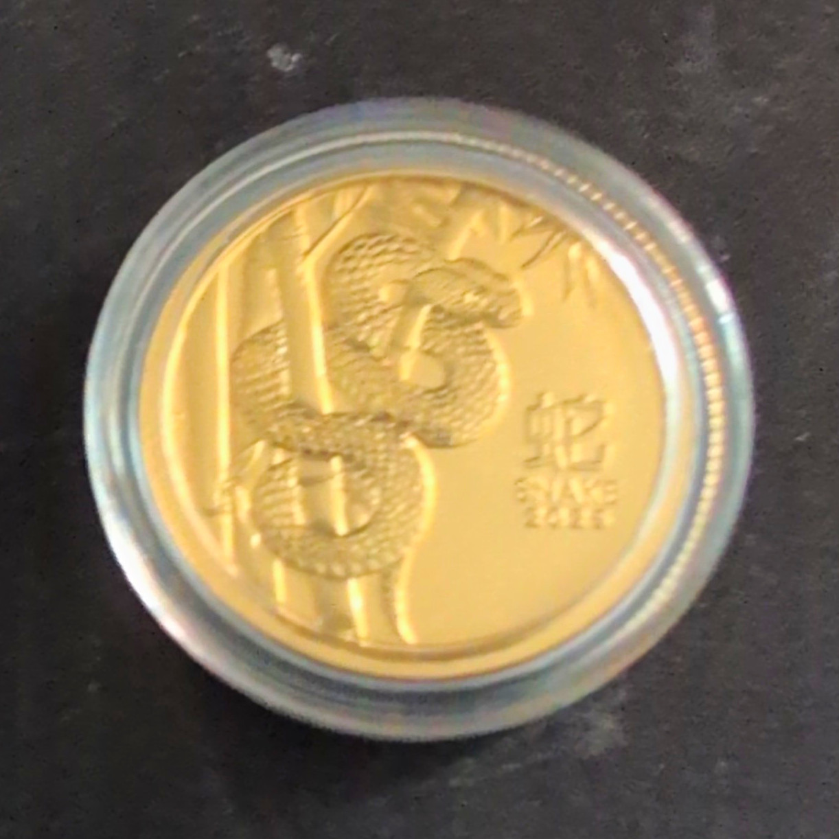 2024 Australia $25 1/4 Oz .9999 Gold Snake Coin - Charles III 2024 Australia $25 1/4 Oz .9999 Gold Snake Coin - Charles III