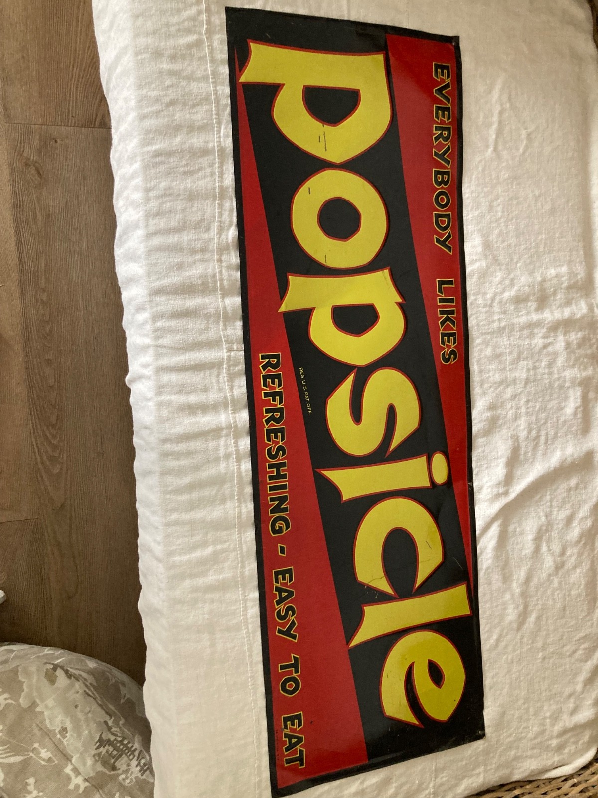 Beautiful vintage “Everyone loves Popsicle” tin litho sign 36 x 12 inches