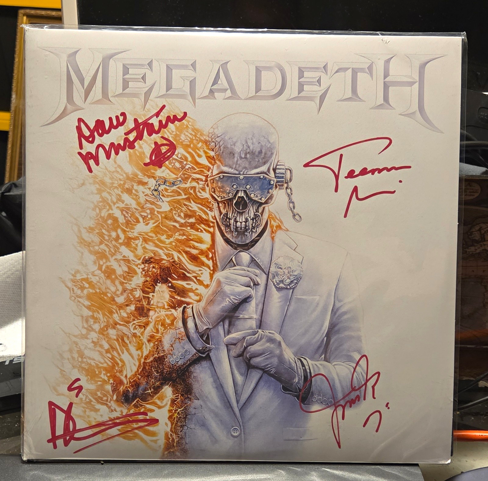 Megadeth Signed Record Sleeve w/ Multiple Red Signatures & Inscriptions Megadeth Signed Record Sleeve w/ Multiple Red Signatures & Inscriptions