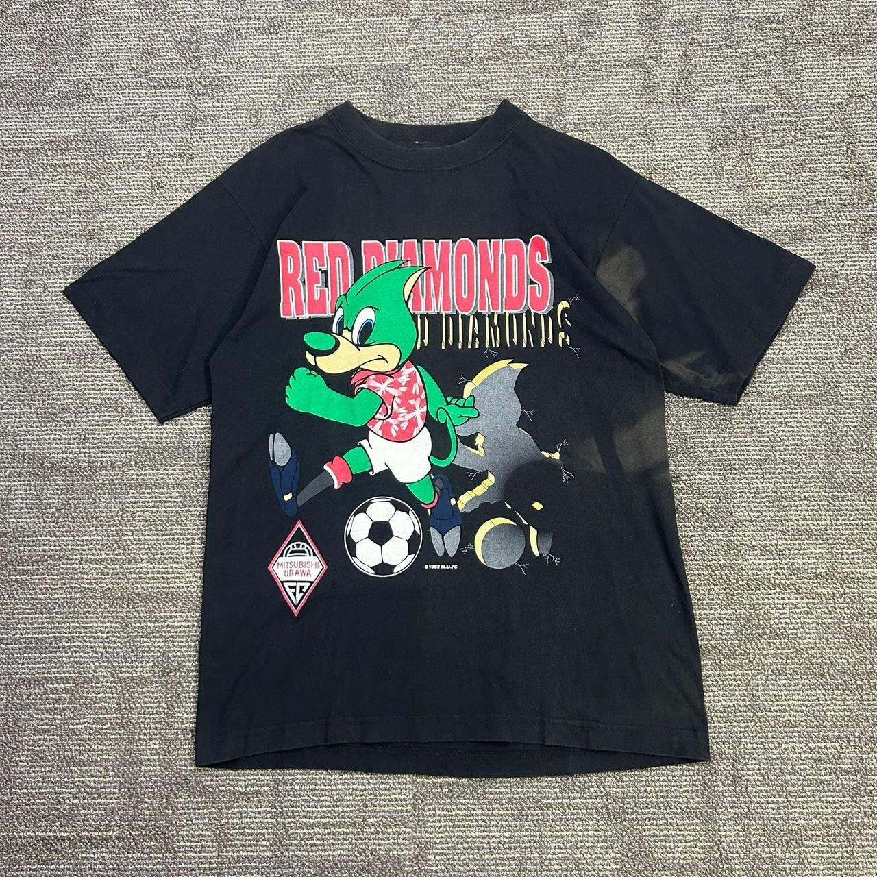 Vintage 1992 Nutmeg Mills Urawa Red Diamonds Mascot Japanese League Tee Vintage 1992 Nutmeg Mills Urawa Red Diamonds Mascot Japanese League Tee