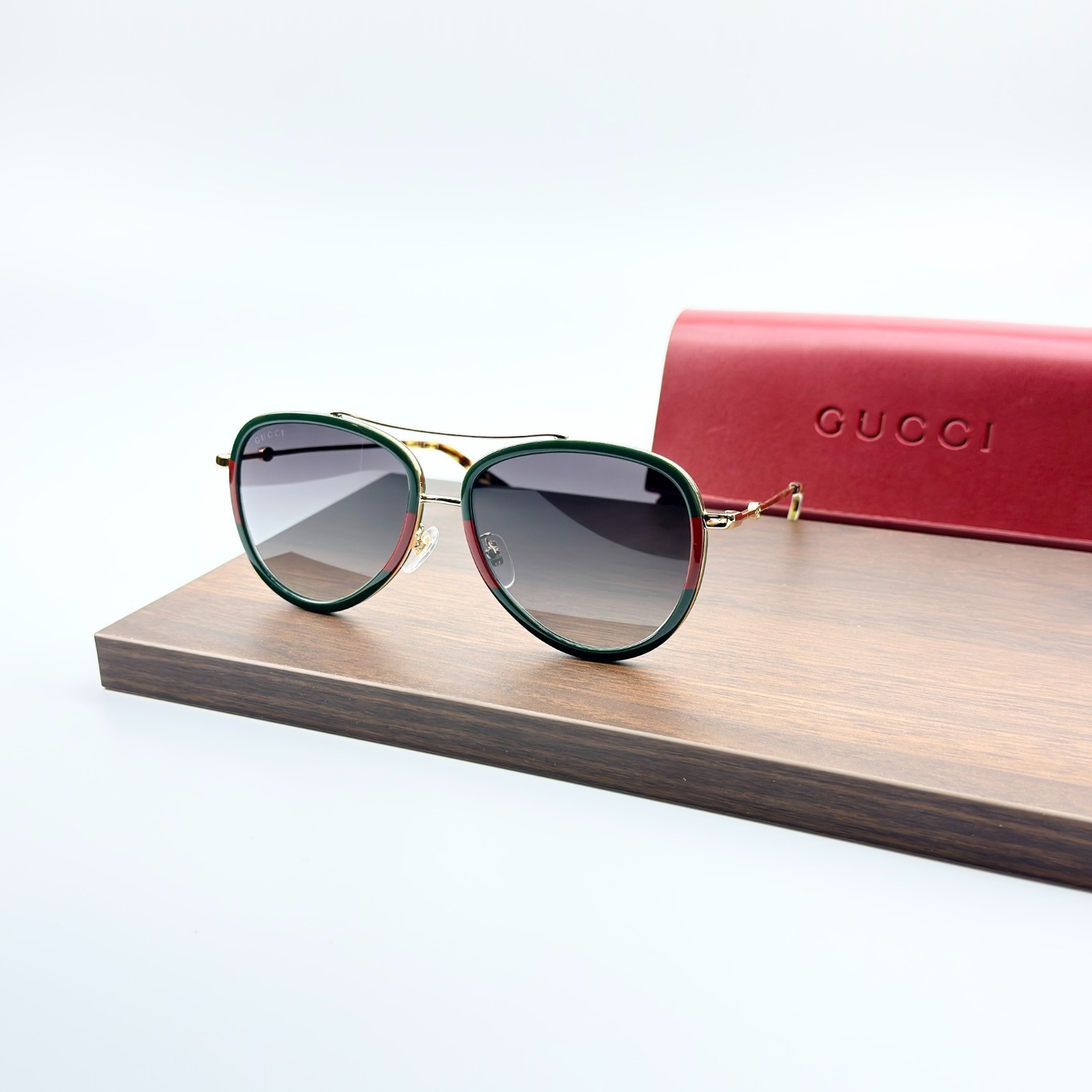 Gucci GG0062S 57mm Aviator Green/Red Unisex Sunglasses with Light Grey Lens Gucci GG0062S 57mm Aviator Green/Red Unisex Sunglasses with Light Grey Lens