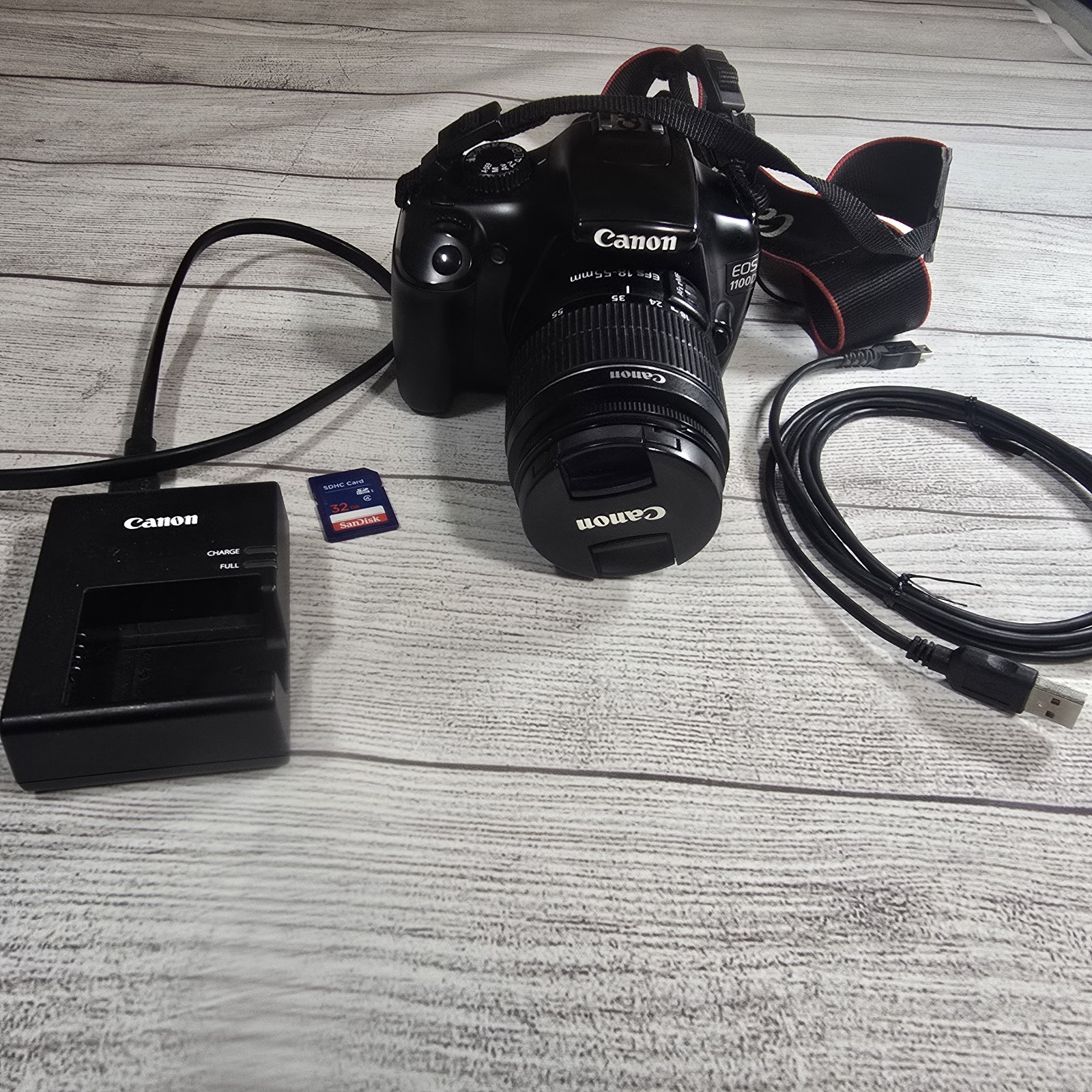 Canon EOS 1100D DSLR Digital Camera w/ Canon EF-S 18-55mm W/ 32gb Sd Canon EOS 1100D DSLR Digital Camera w/ Canon EF-S 18-55mm W/ 32gb Sd