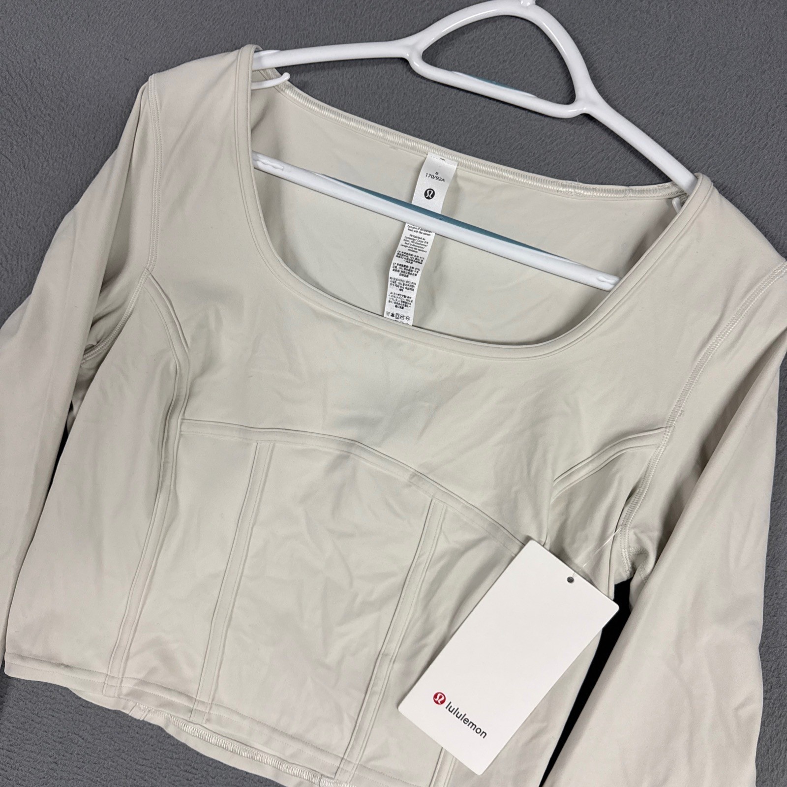 Lululemon Waist-Seamed Nulu Shirt Womens 8 Bone Corset Slim Long Sleeve NWT New Lululemon Waist-Seamed Nulu Shirt Womens 8 Bone Corset Slim Long Sleeve NWT New