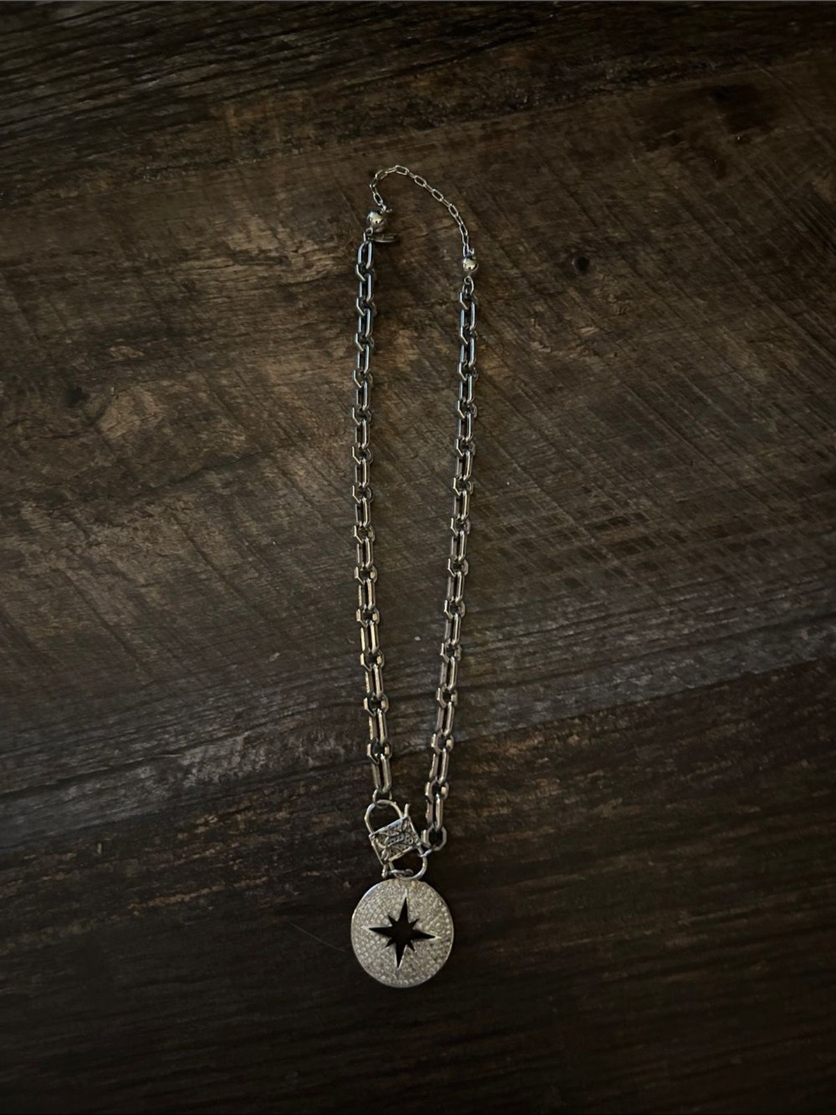 Melania Clara Silver Starburst Pendant Necklace