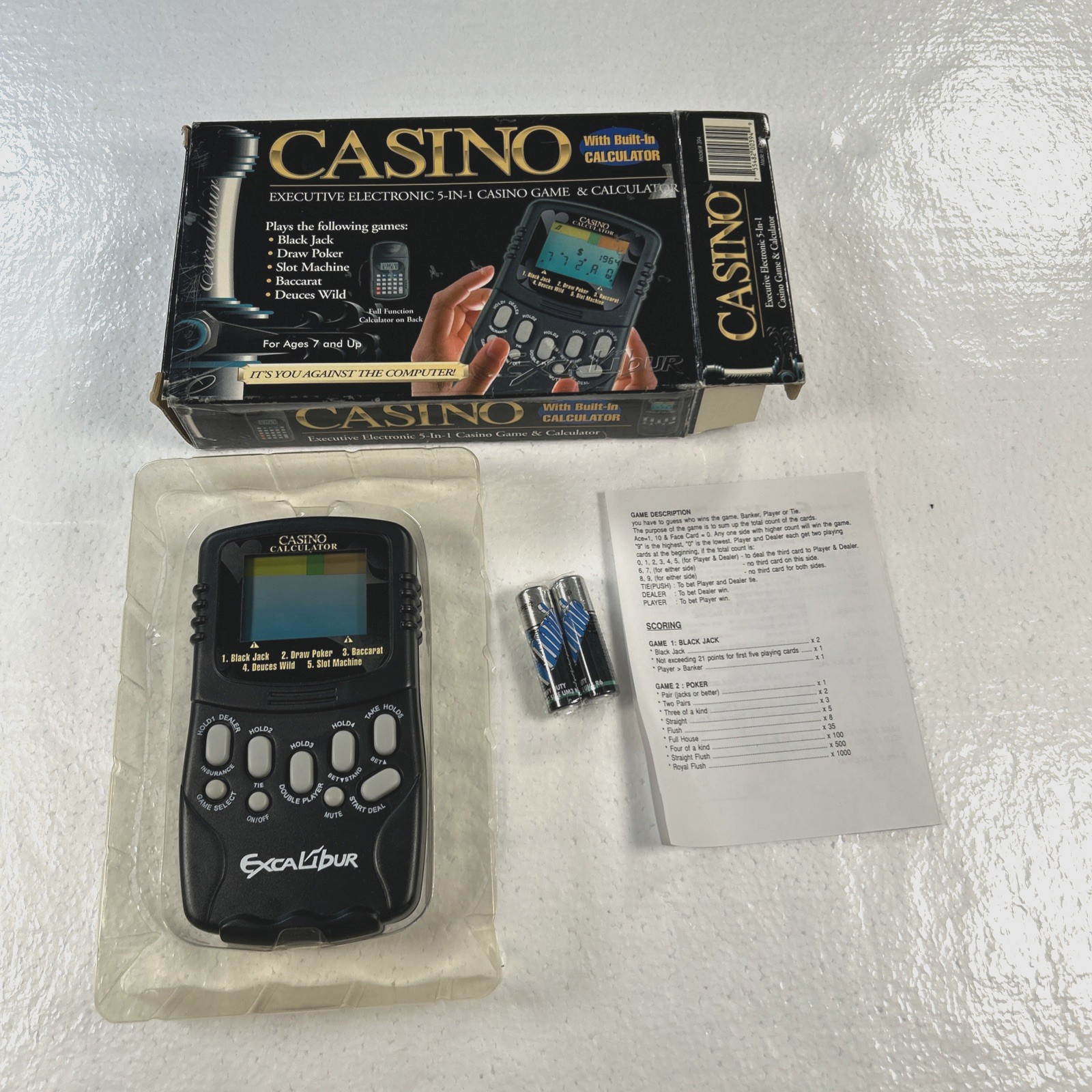 Excalibur Executive Electronic Casino 5-in-1 Handheld Game with Calculator Excalibur Executive Electronic Casino 5-in-1 Handheld Game with Calculator