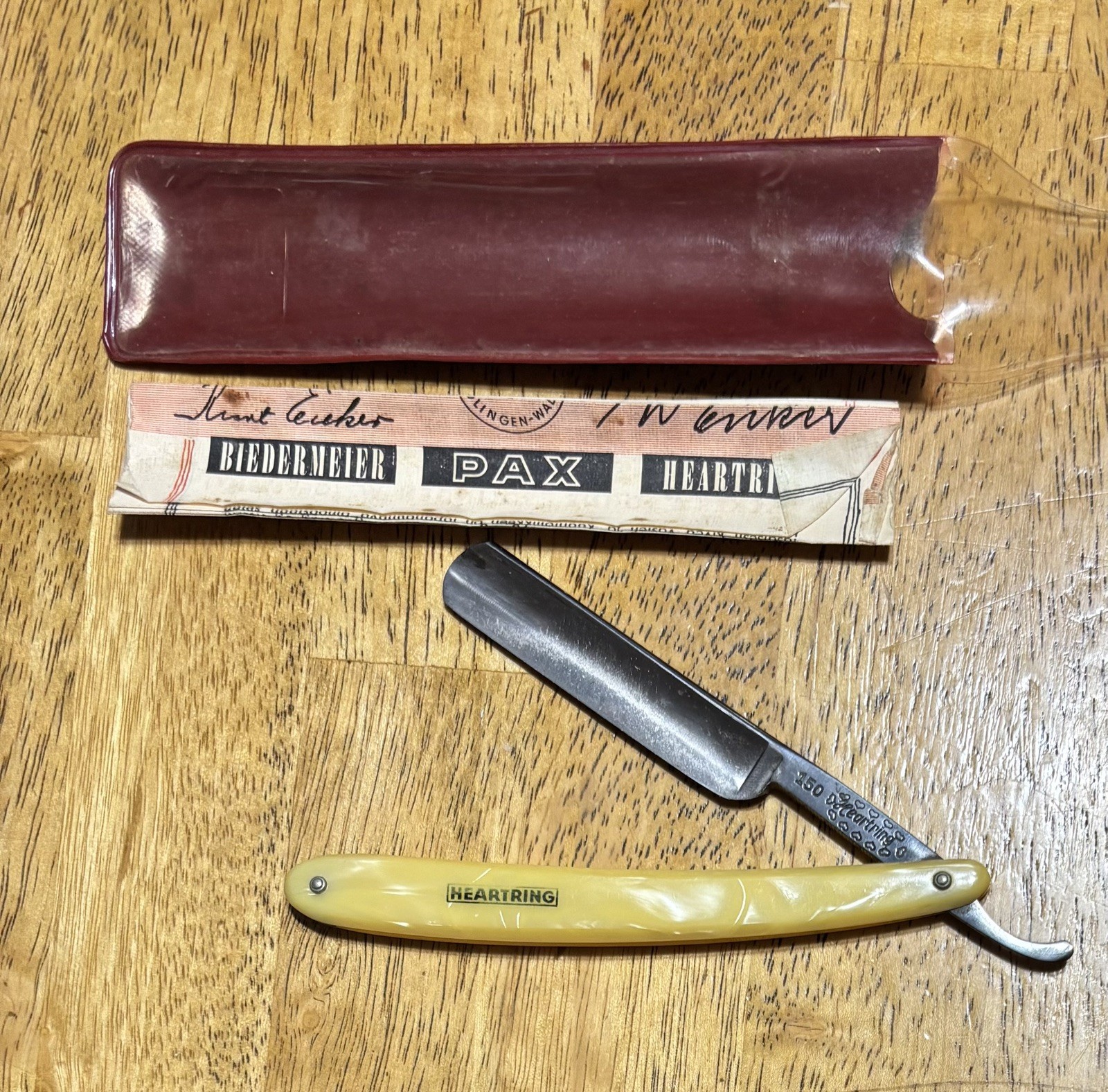 SOLINGEN H. EICKER & SOHNE HEARTRING STRAIGHT RAZOR  with Warranty paperwork 
