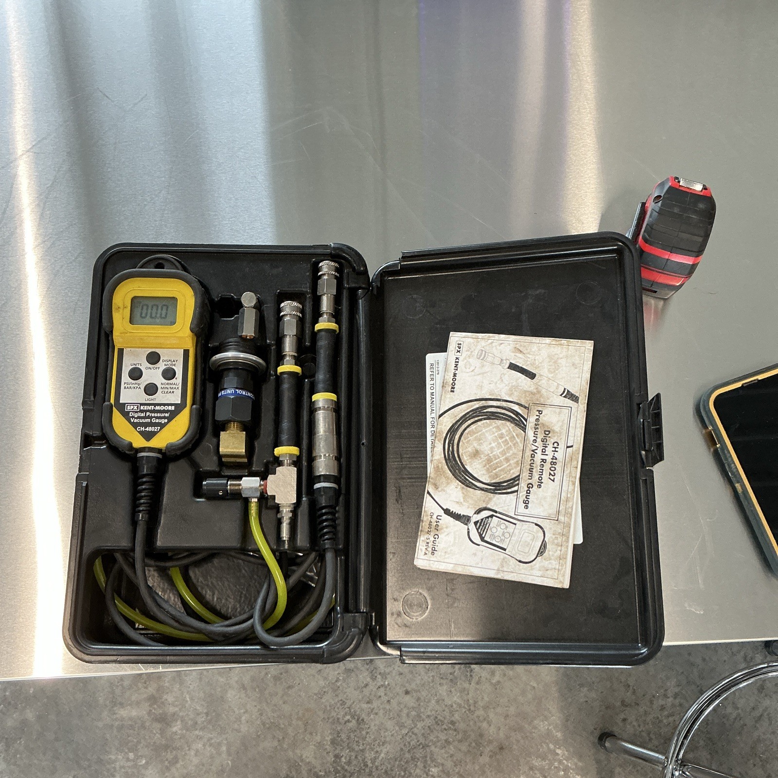 SPx Kent-Moore CH-48027 Digital Remote Pressure and Vacuum Gauge. SPx Kent-Moore CH-48027 Digital Remote Pressure and Vacuum Gauge.