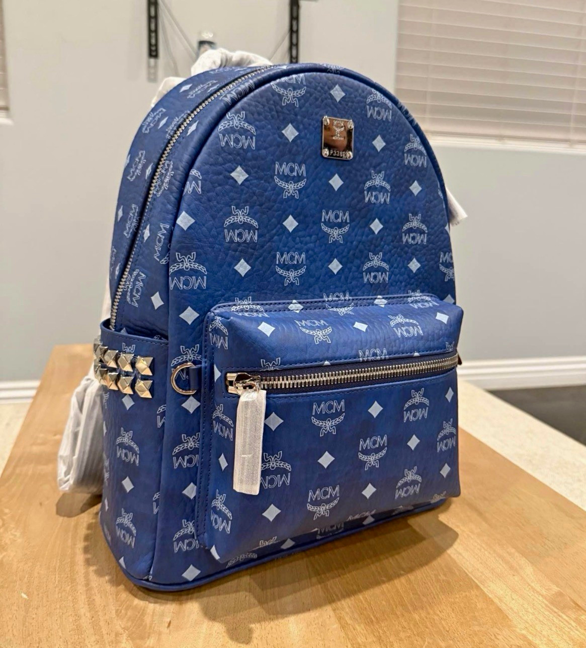 MCM Stark Visetos Monogram Pebbled Leather Backpack Blue Studded Sides Silver