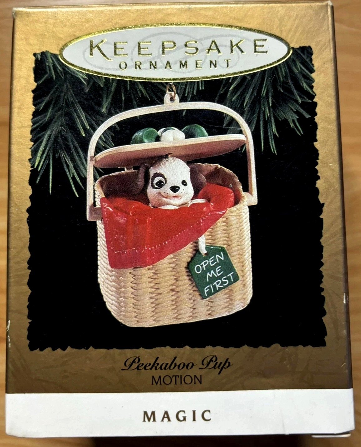 Hallmark  1994 Keepsake Magic Motion Peek-a-Boo Pup Ornament Christmas Works