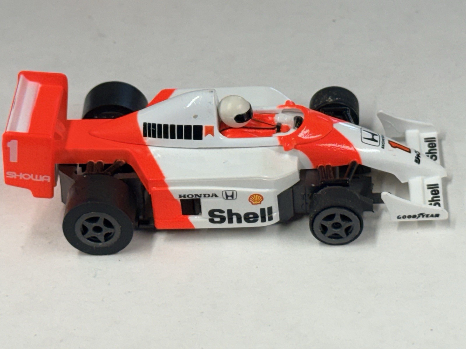 VERY RARE TYCO 440 SHELL FLUORECENT MCLAREN HONDA #1 INDY F1 HO SLOT CAR Roller VERY RARE TYCO 440 SHELL FLUORECENT MCLAREN HONDA #1 INDY F1 HO SLOT CAR Roller