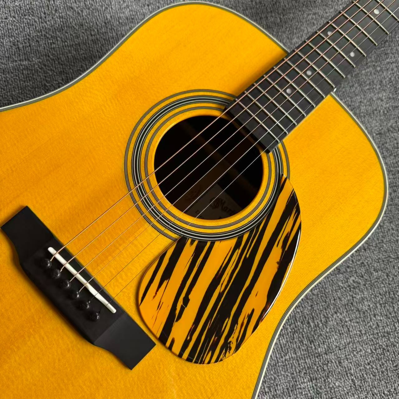 41-inch all-solid acoustic guitar with ebony fretboard 41-inch all-solid acoustic guitar with ebony fretboard