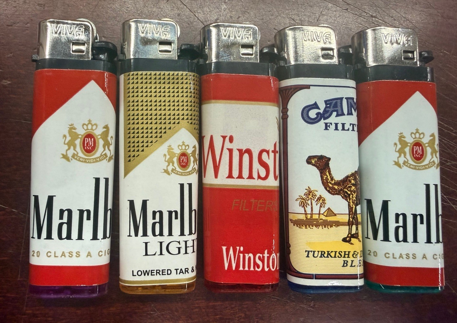 5 Cigarette Lighters Winston Camel Marlboro Vintage New and Working 5 Cigarette Lighters Winston Camel Marlboro Vintage New and Working