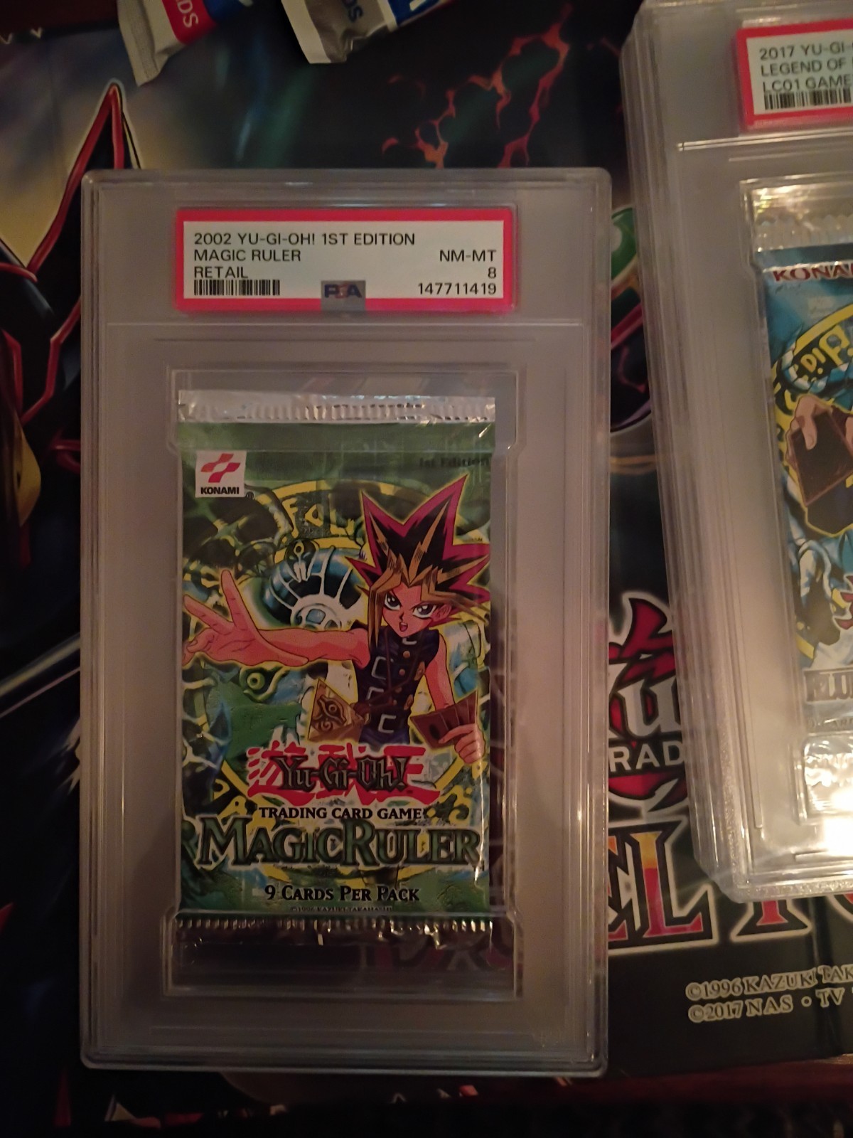 2002 Yu-Gi-Oh Magic Ruler Booster Pack, 1st Edition, Graded PSA 8 NM-MT 2002 Yu-Gi-Oh Magic Ruler Booster Pack, 1st Edition, Graded PSA 8 NM-MT