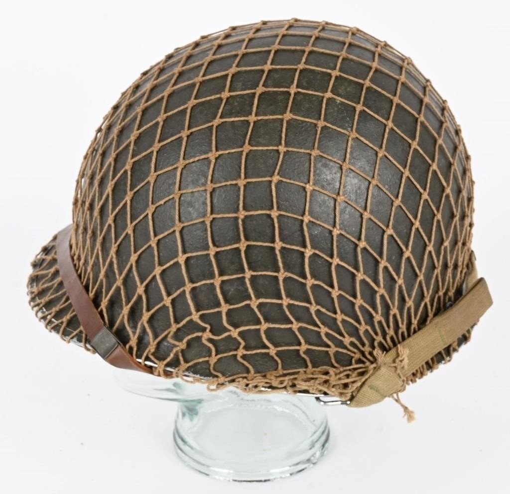 Original WWII US Army M1 Combat Helmet front seam, swivel bale, netting leather Original WWII US Army M1 Combat Helmet front seam, swivel bale, netting leather