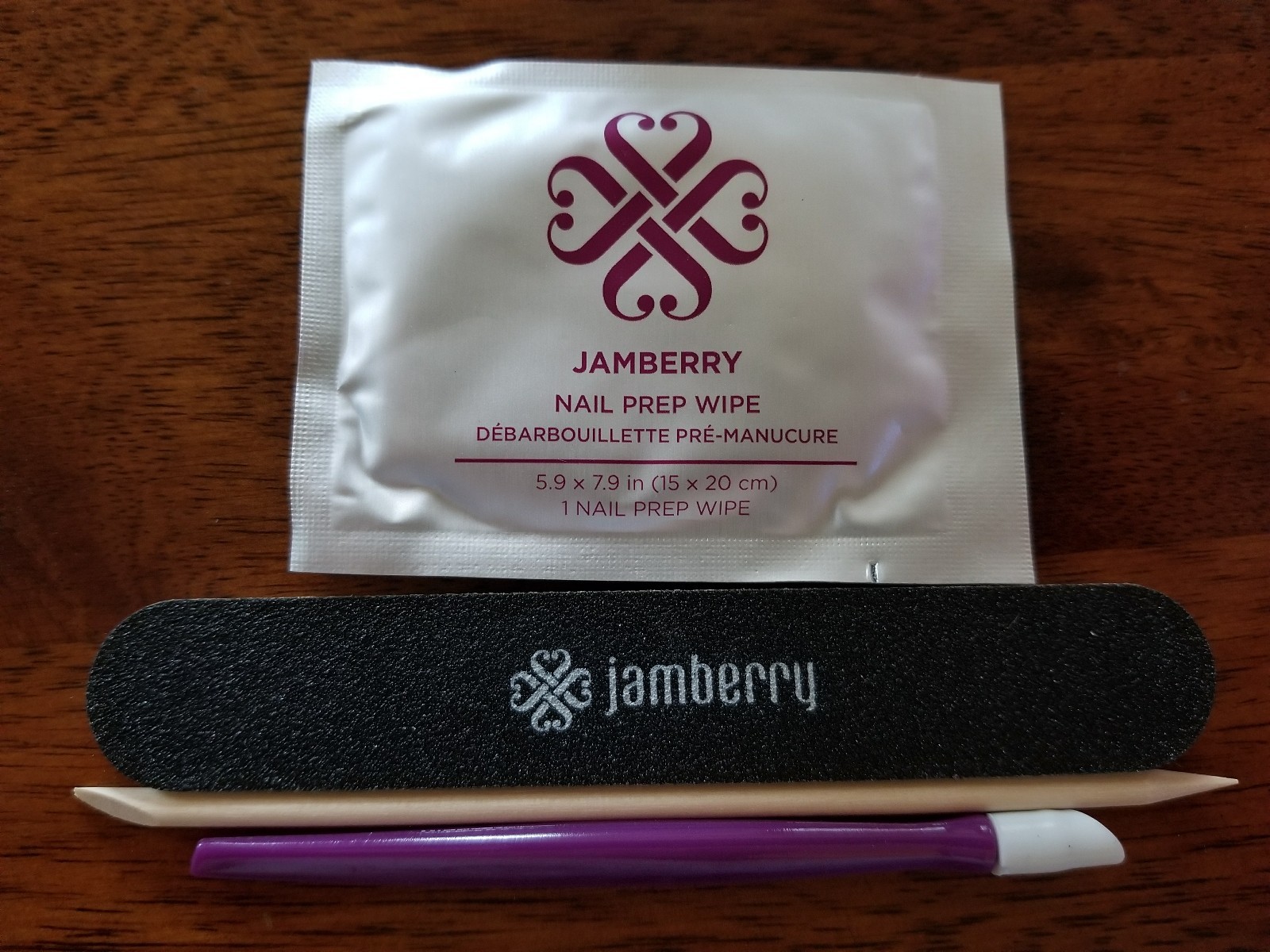 Jamberry mini application kit/tools ~ black nail file, orange stick, plum pusher Jamberry mini application kit/tools ~ black nail file, orange stick, plum pusher