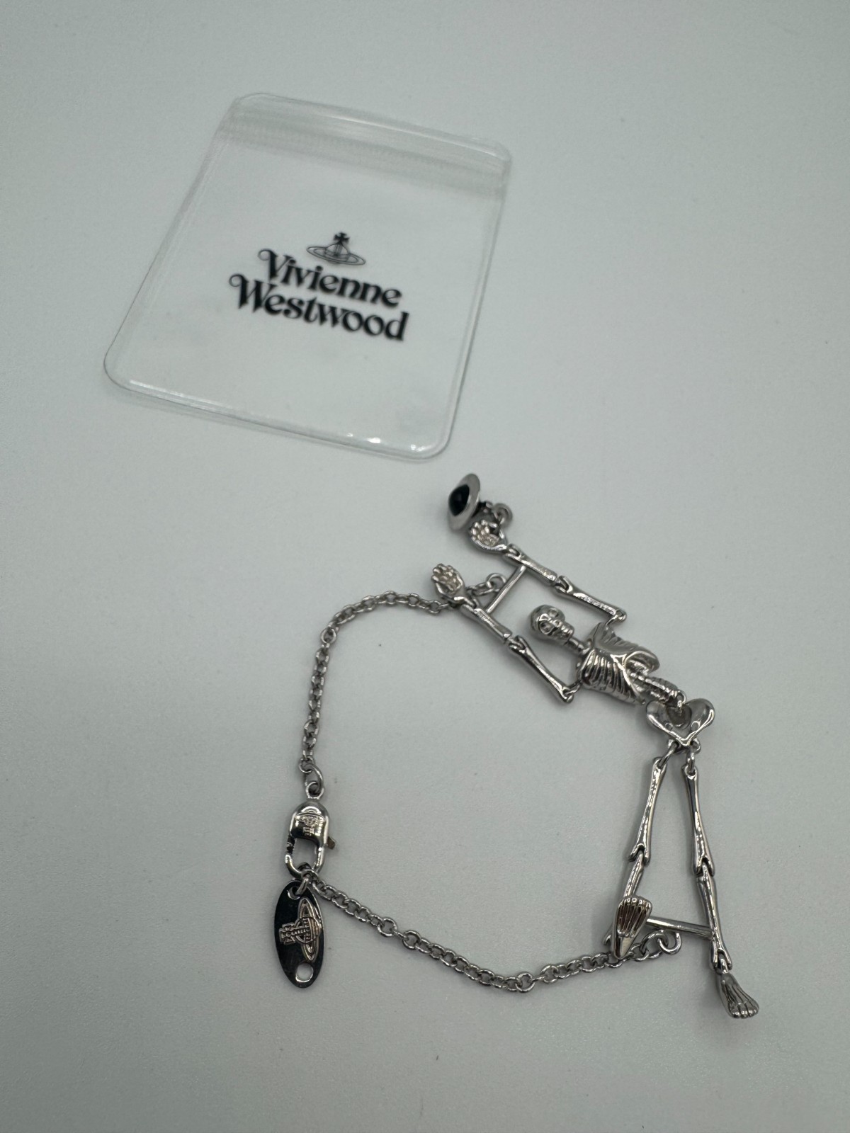 Vivienne Westwood Ariel Skeleton Mermaid Skull Orb Bracelet with drawstring