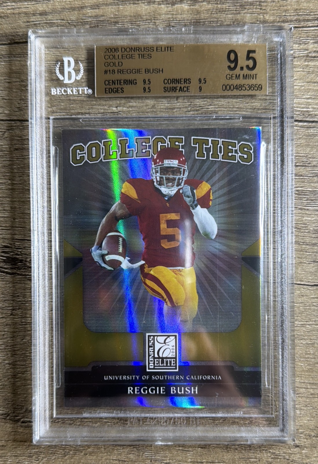 2006 Donruss Elite - College Ties Reggie Bush #CT-18 Gold /500 (RC) BGS 9.5