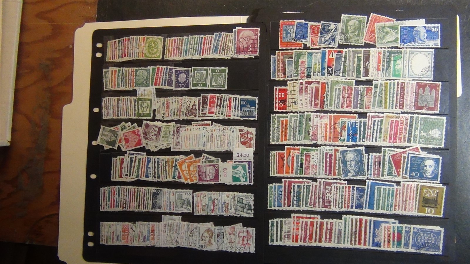 Stampsweis Germany Bund loaded collection on black stock est many 100s stamps
