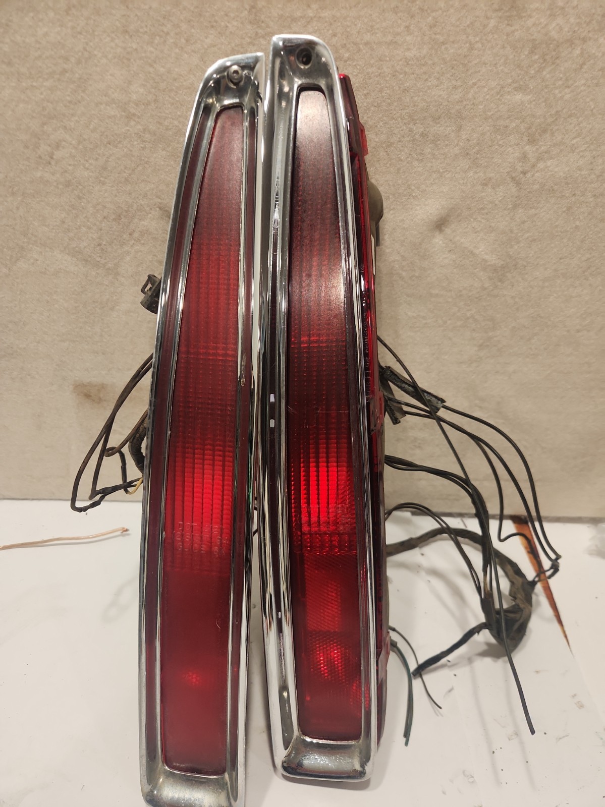 1994-1999 Cadillac Deville- Tail Lights (pair) w/ Chrome Trim 1994-1999 Cadillac Deville- Tail Lights (pair) w/ Chrome Trim