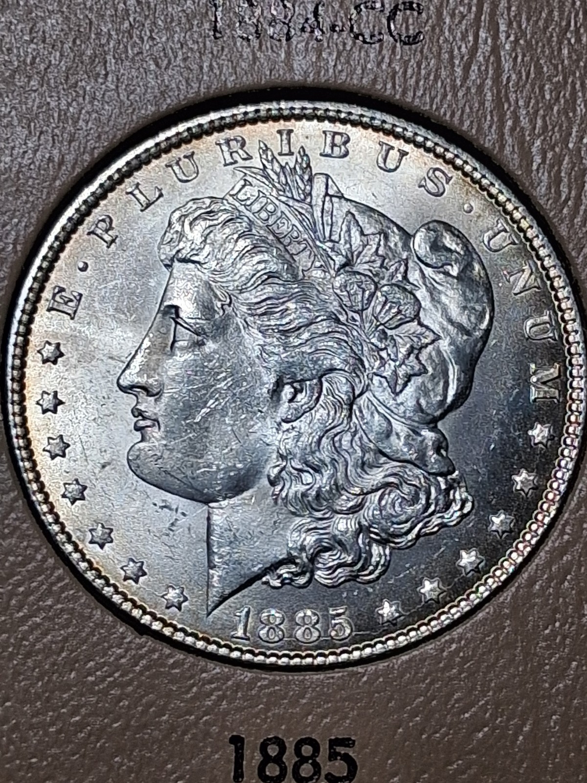 1885-P MORGAN DOLLAR. MS/ BU/ CHOICE GEM GREAT GOLD RIM TONING PRISTINE. BEAUTY. 1885-P MORGAN DOLLAR. MS/ BU/ CHOICE GEM GREAT GOLD RIM TONING PRISTINE. BEAUTY.