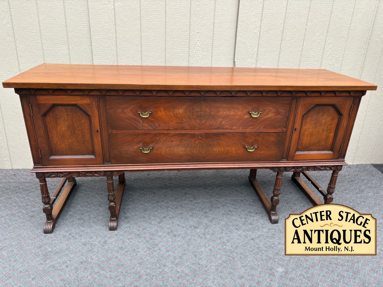 68181  Elegant Early 20th Century Walnut Buffet with Carved Detailing
