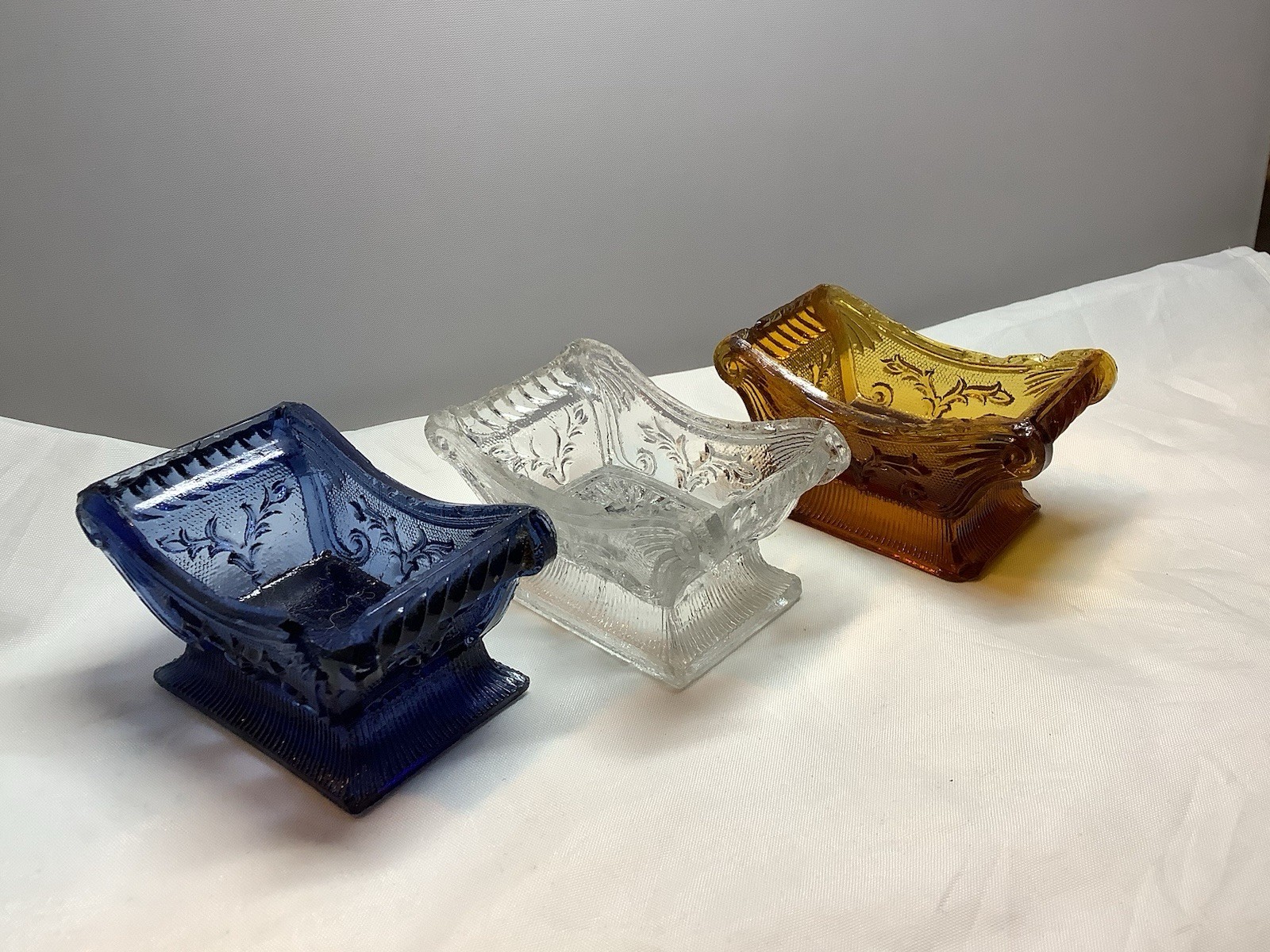 Antique Boston & Sandwich Lacy Glass SN1 Blue, Clear, & Amber Open Salt Cellars Antique Boston & Sandwich Lacy Glass SN1 Blue, Clear, & Amber Open Salt Cellars