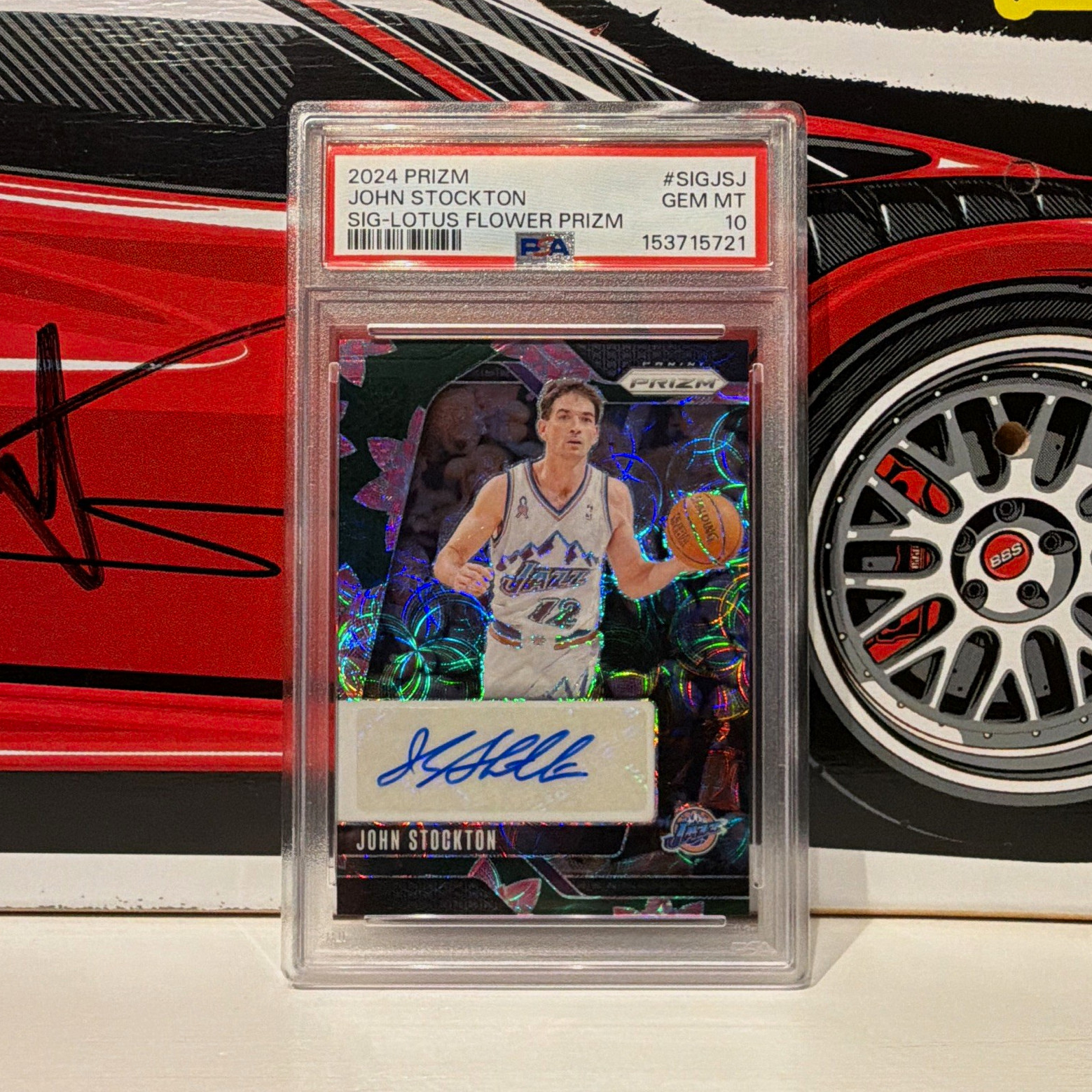Panini Prizm 2024-25 John Stockton Signatures Lotus Flower Auto /18 PSA 10 Panini Prizm 2024-25 John Stockton Signatures Lotus Flower Auto /18 PSA 10