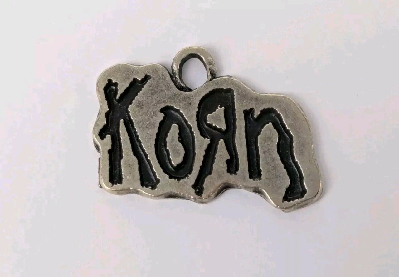 Vtg 1990’s KORN Charm Pendant Pewter Metal Rock Band NuMetal Necklace Bracelet Vtg 1990’s KORN Charm Pendant Pewter Metal Rock Band NuMetal Necklace Bracelet