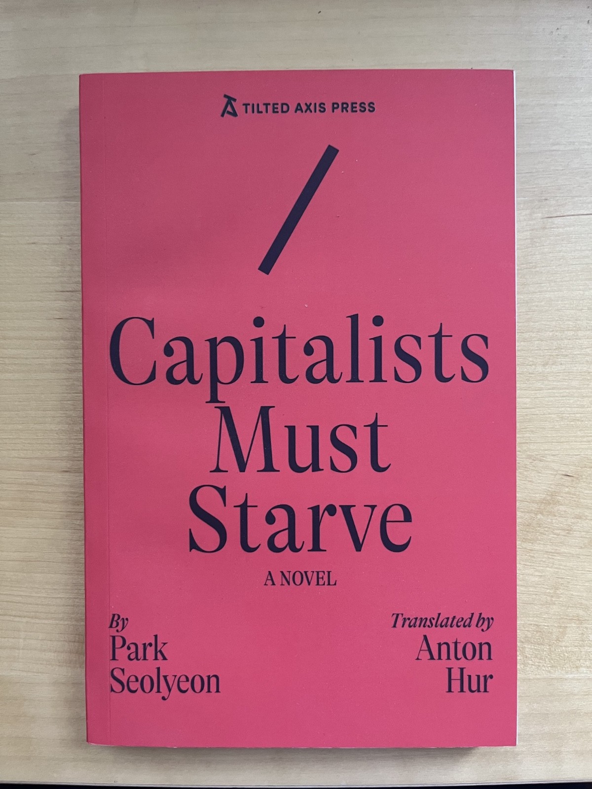Capitalists Must Starve: A Novel (Paperback) Capitalists Must Starve: A Novel (Paperback)