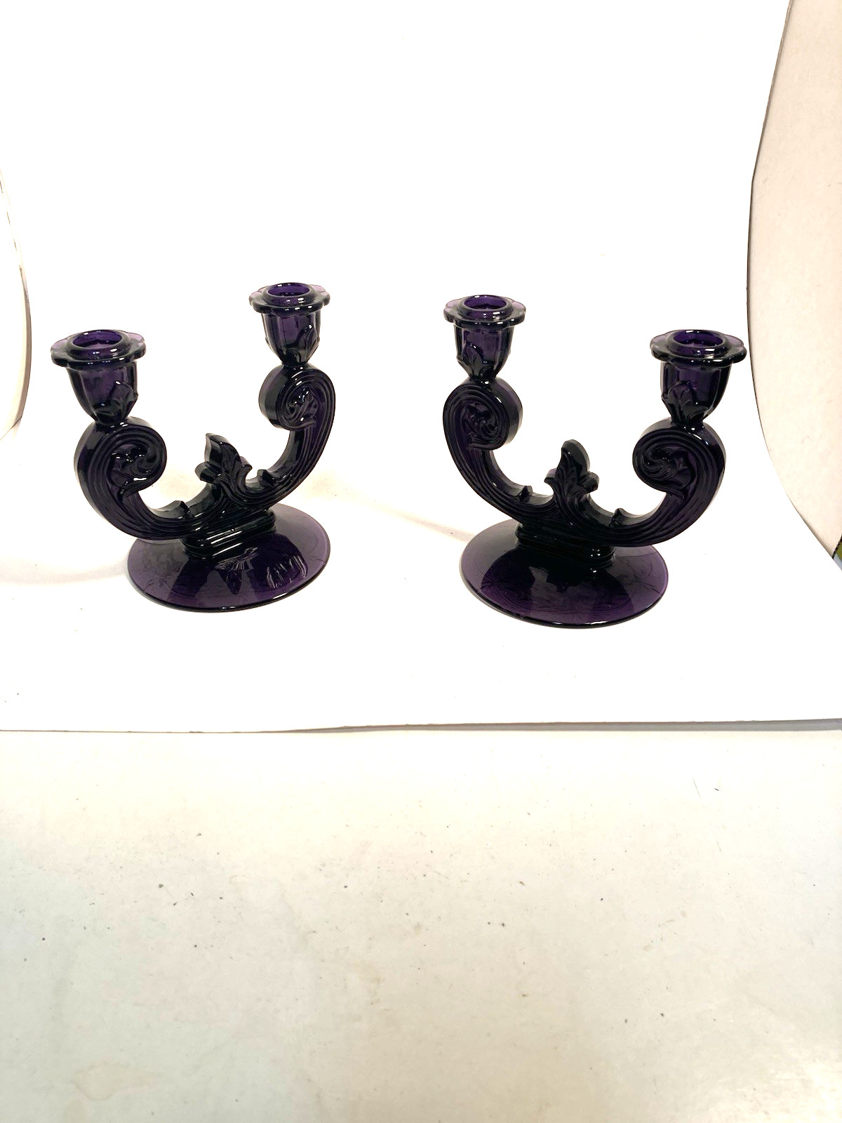 Vintage pair of double candle sticks, debossed floral design, irradiated.