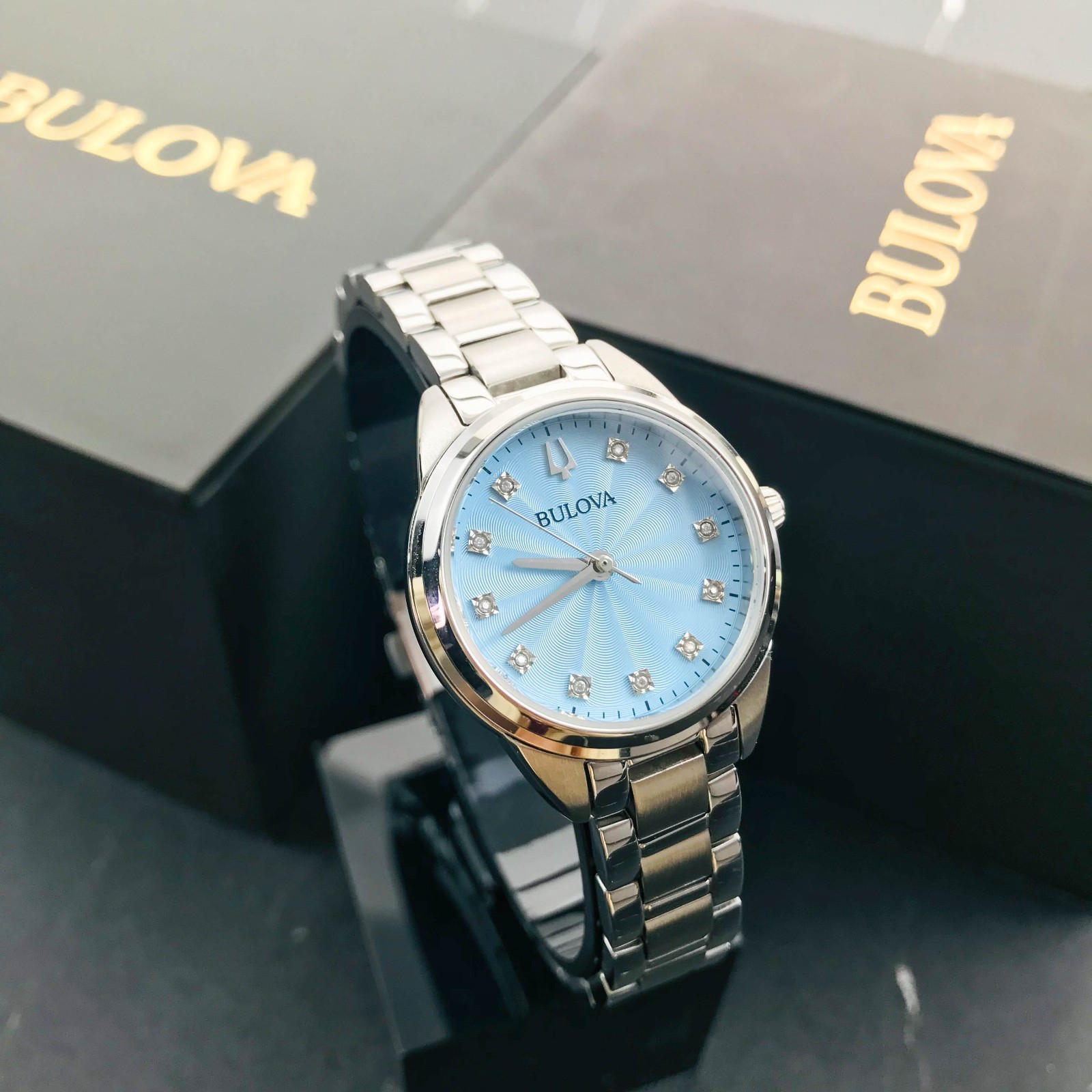 Bulova Classic Sutton 96P250 Blue Dial 28MM Quartz Ladies Watch with 11 Diamonds