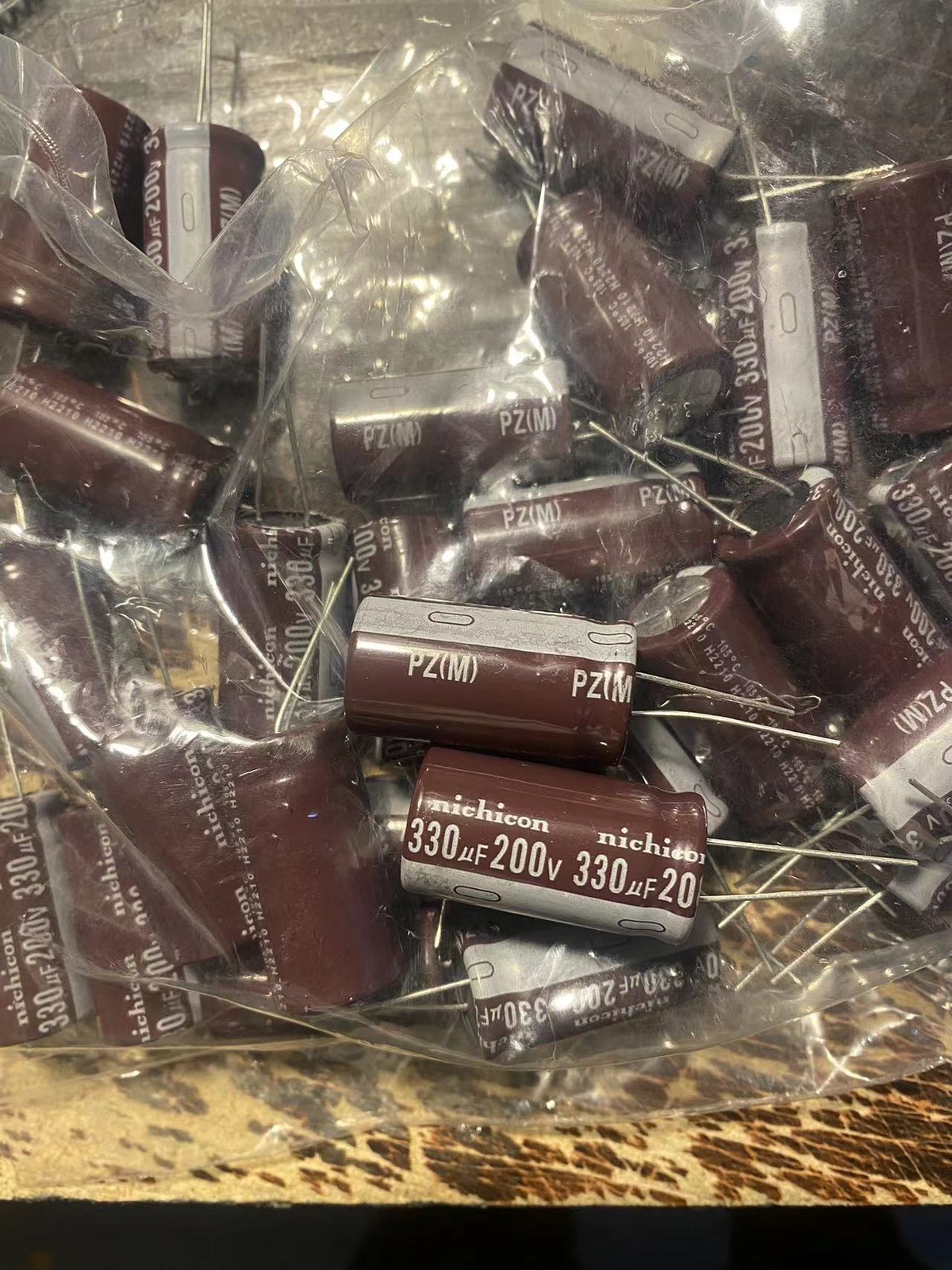 5PCS Nichicon PZ 330uf200v Electrolytic capacitor 200v 330uf 18x35mm 105C 5PCS Nichicon PZ 330uf200v Electrolytic capacitor 200v 330uf 18x35mm 105C