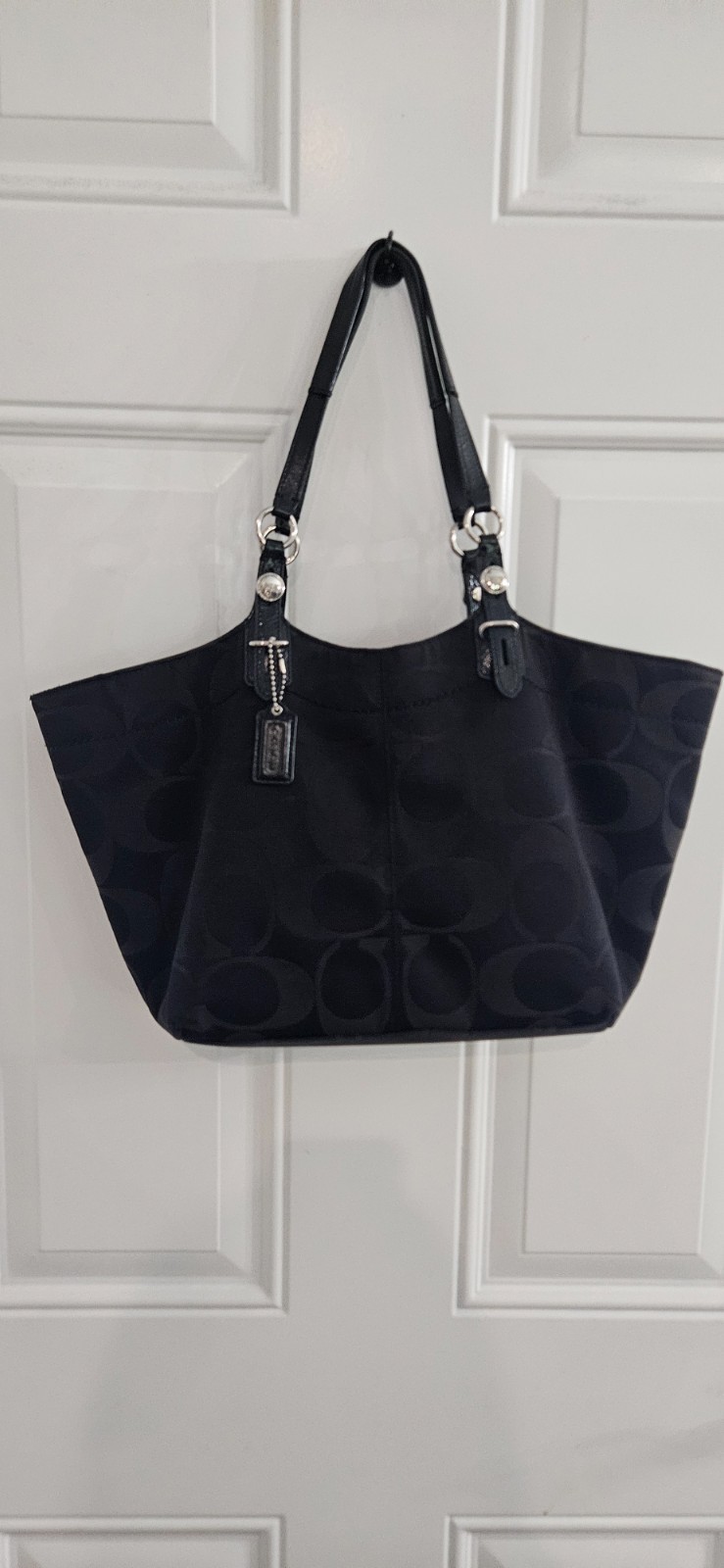 Coach signature black sateen tote bag silver hardware purple interior Coach signature black sateen tote bag silver hardware purple interior