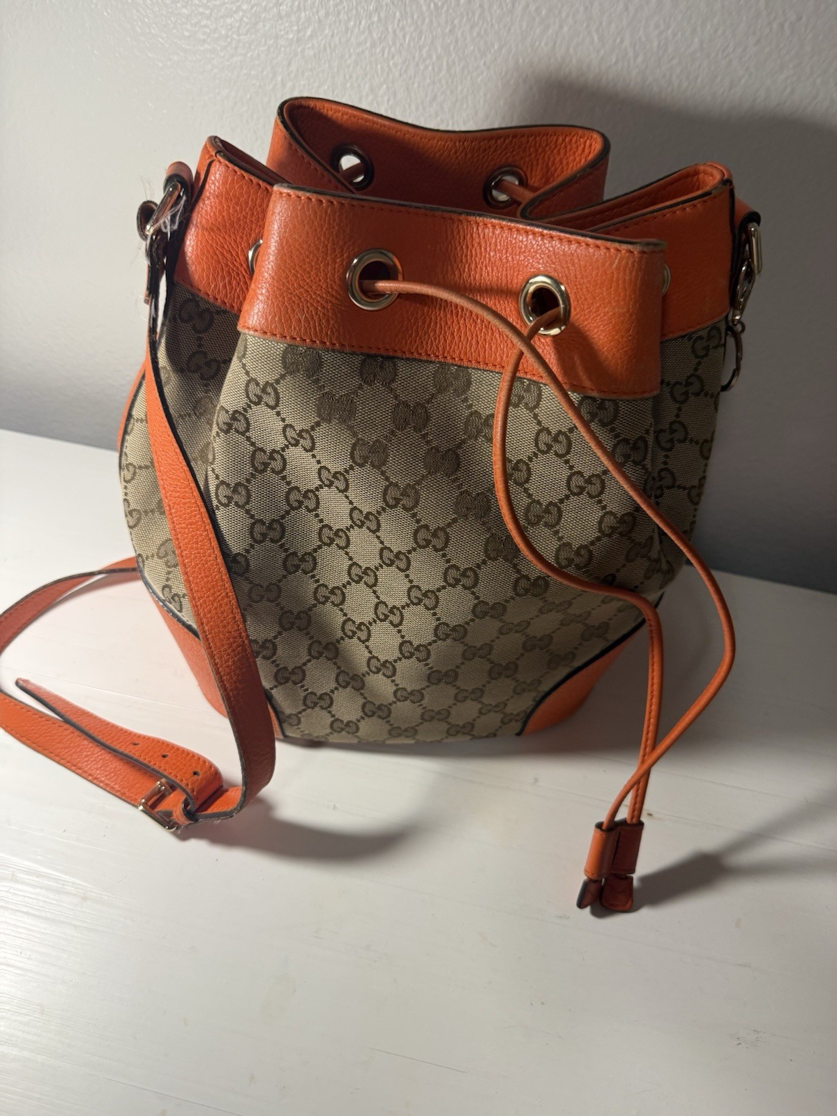 Authentic Gucci GG Supreme Bucket Bag Orange Leather Trim Crossbody Drawstring Authentic Gucci GG Supreme Bucket Bag Orange Leather Trim Crossbody Drawstring