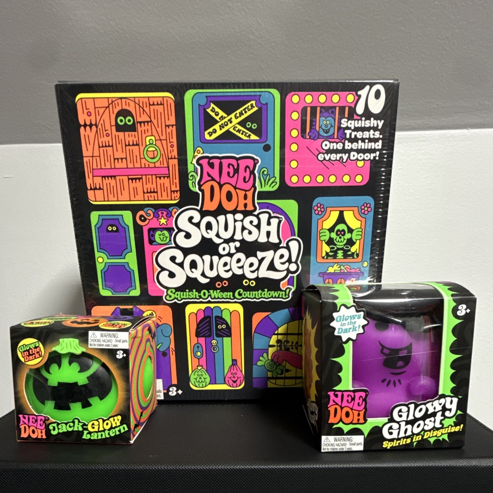 NeeDoh Halloween Bundle. Squish or Squeeeze, Green Lantern & Purple Glowy Ghost NeeDoh Halloween Bundle. Squish or Squeeeze, Green Lantern & Purple Glowy Ghost