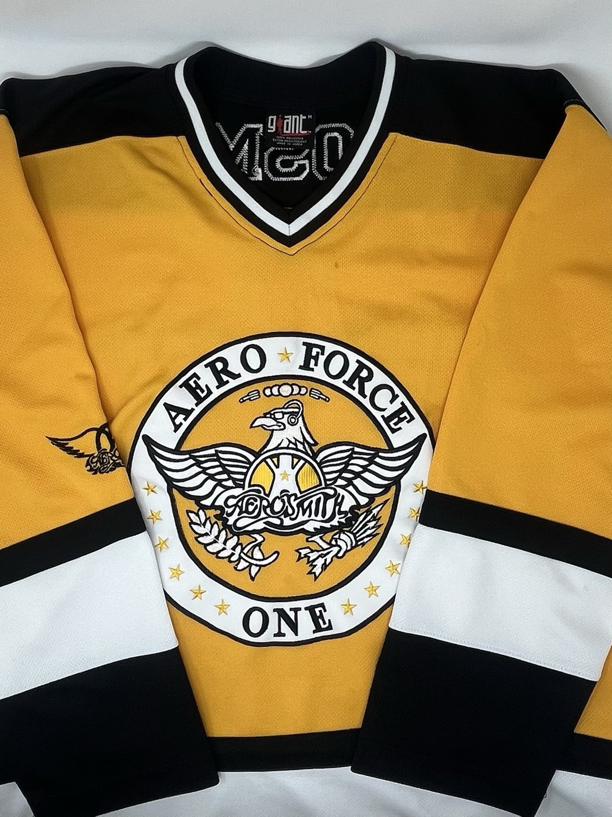 Vintage 2003 Aerosmith Tour Boston Bruins Hockey Giant Tag Yellow Jersey (M) Vintage 2003 Aerosmith Tour Boston Bruins Hockey Giant Tag Yellow Jersey (M)