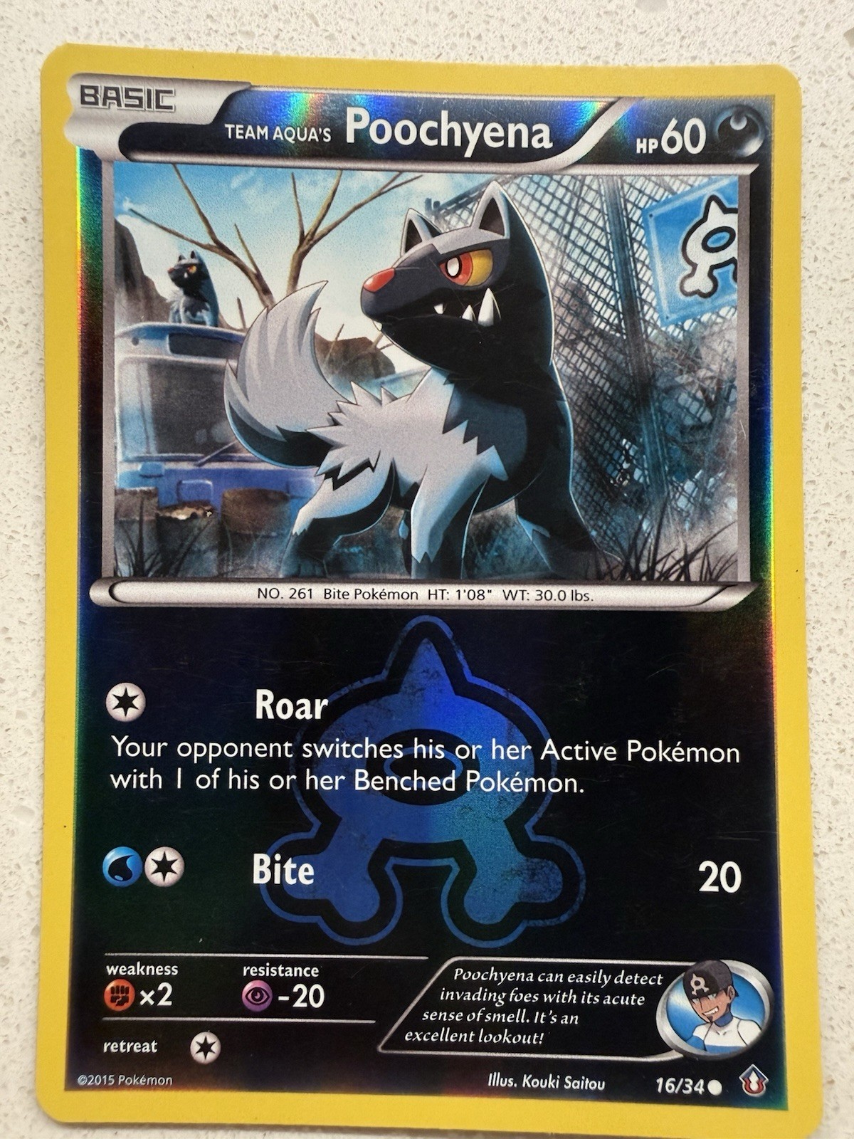 Team Aqua's Poochyena 16/34 Double Crisis Reverse Holo